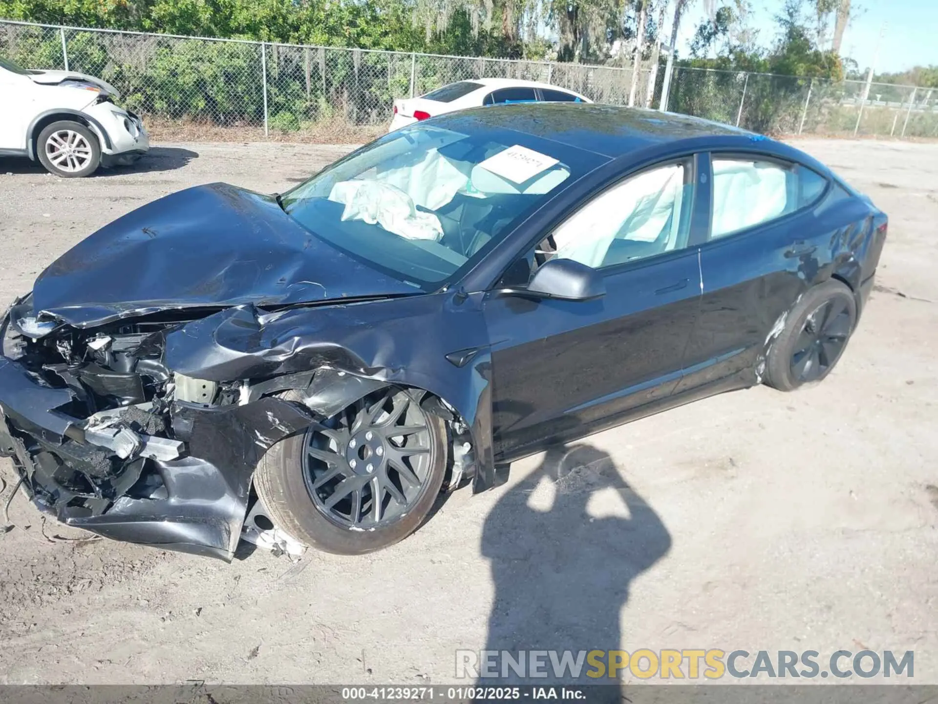 2 fotografías del automóvil dañado 5YJ3E1EA4RF823499 TESLA MODEL 3 2024