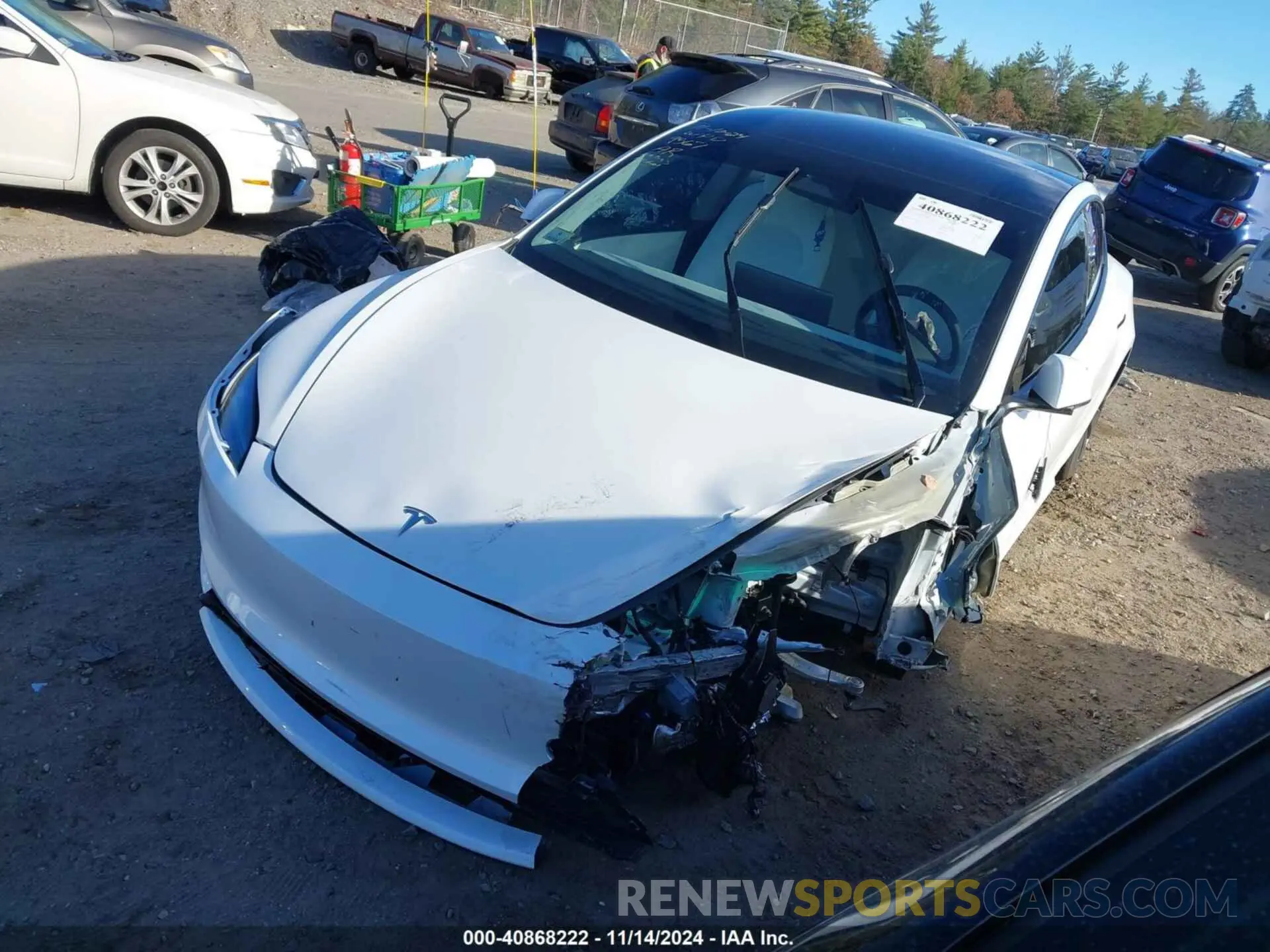 2 fotografías del automóvil dañado 5YJ3E1EA4RF849567 TESLA MODEL 3 2024