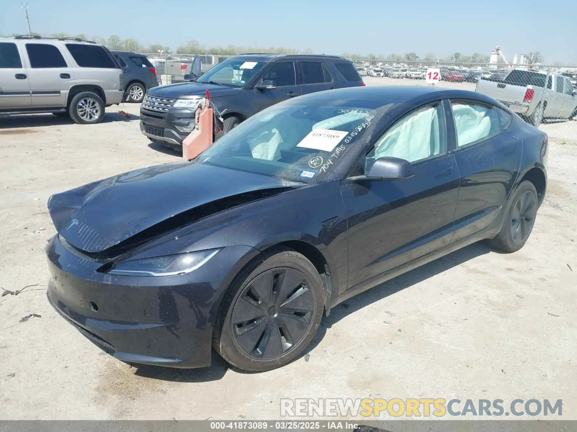 2 fotografías del automóvil dañado 5YJ3E1EA5RF843972 TESLA MODEL 3 2024