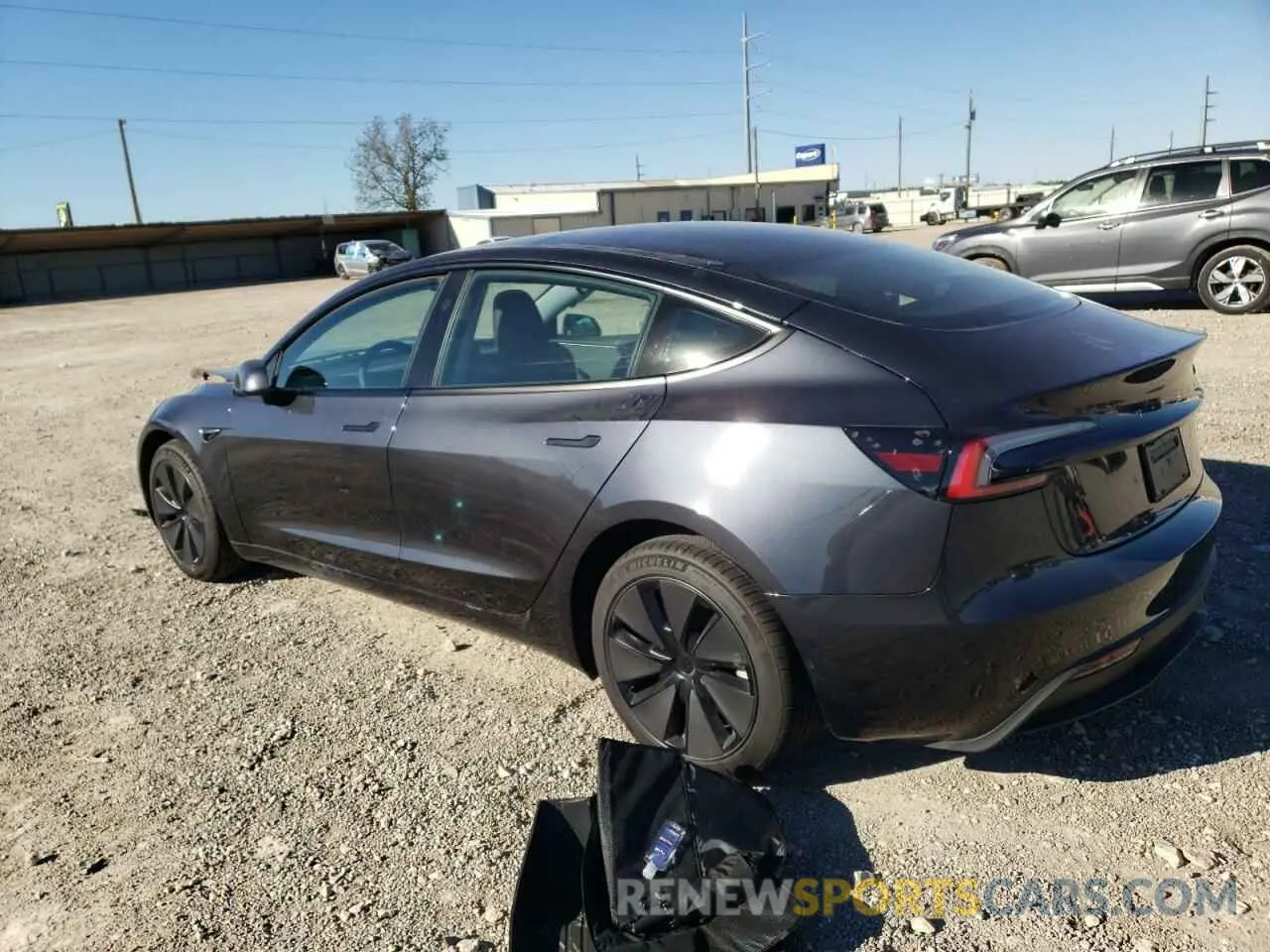 2 fotografías del automóvil dañado 5YJ3E1EA5RF863297 TESLA MODEL 3 2024