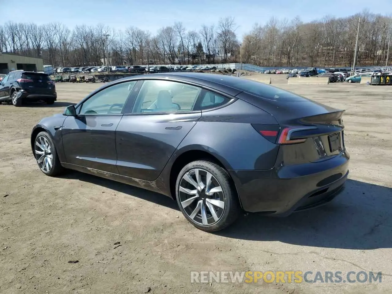 2 fotografías del automóvil dañado 5YJ3E1EA5RF871819 TESLA MODEL 3 2024