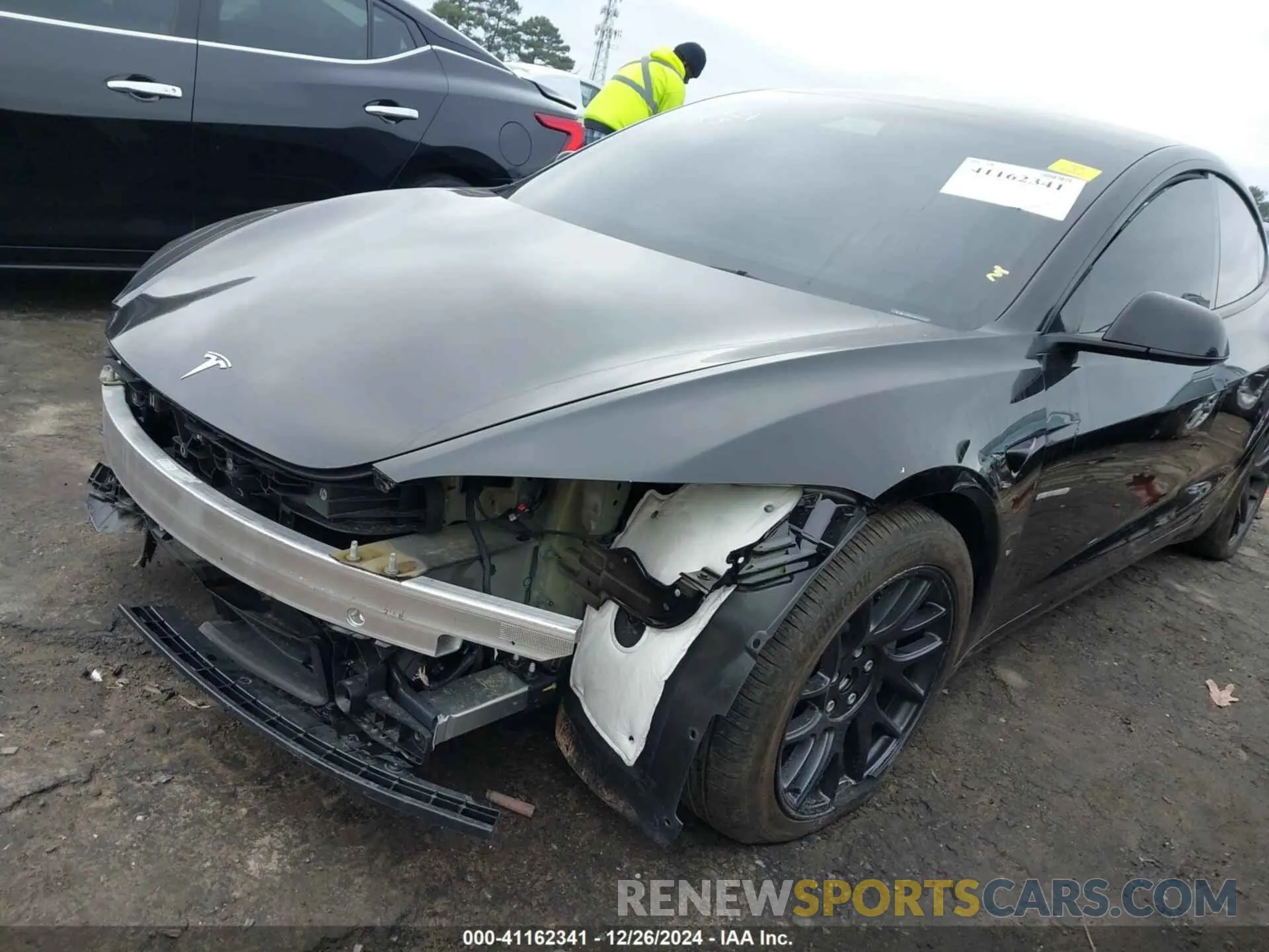 2 fotografías del automóvil dañado 5YJ3E1EA8RF732543 TESLA MODEL 3 2024