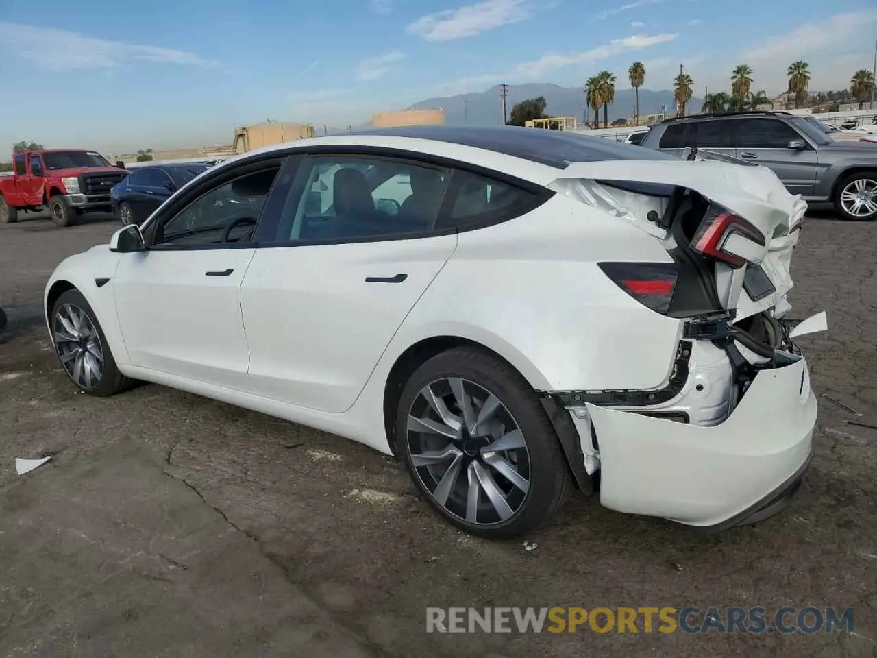 2 fotografías del automóvil dañado 5YJ3E1EA8RF853170 TESLA MODEL 3 2024