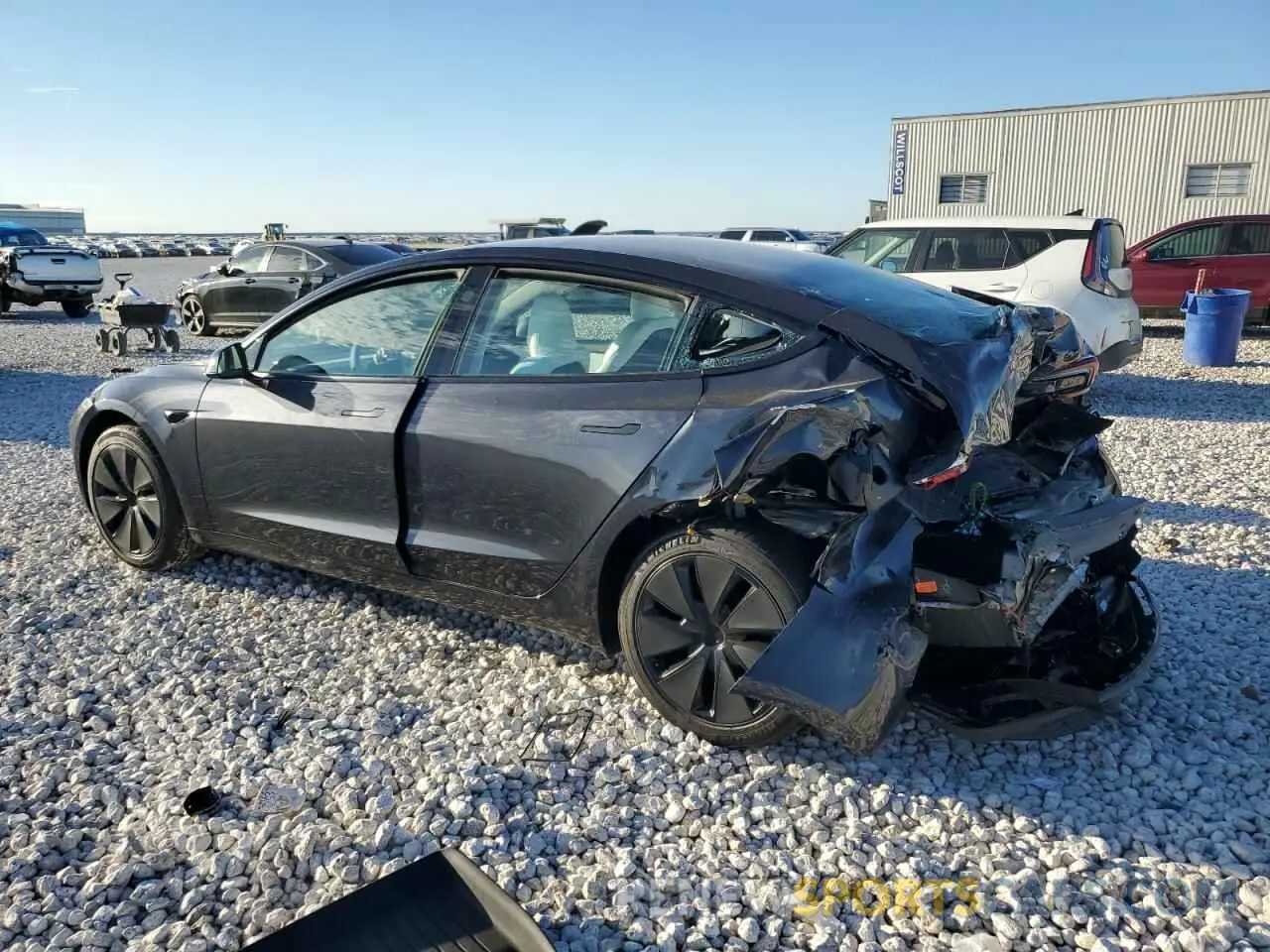 2 fotografías del automóvil dañado 5YJ3E1EA8RF856859 TESLA MODEL 3 2024