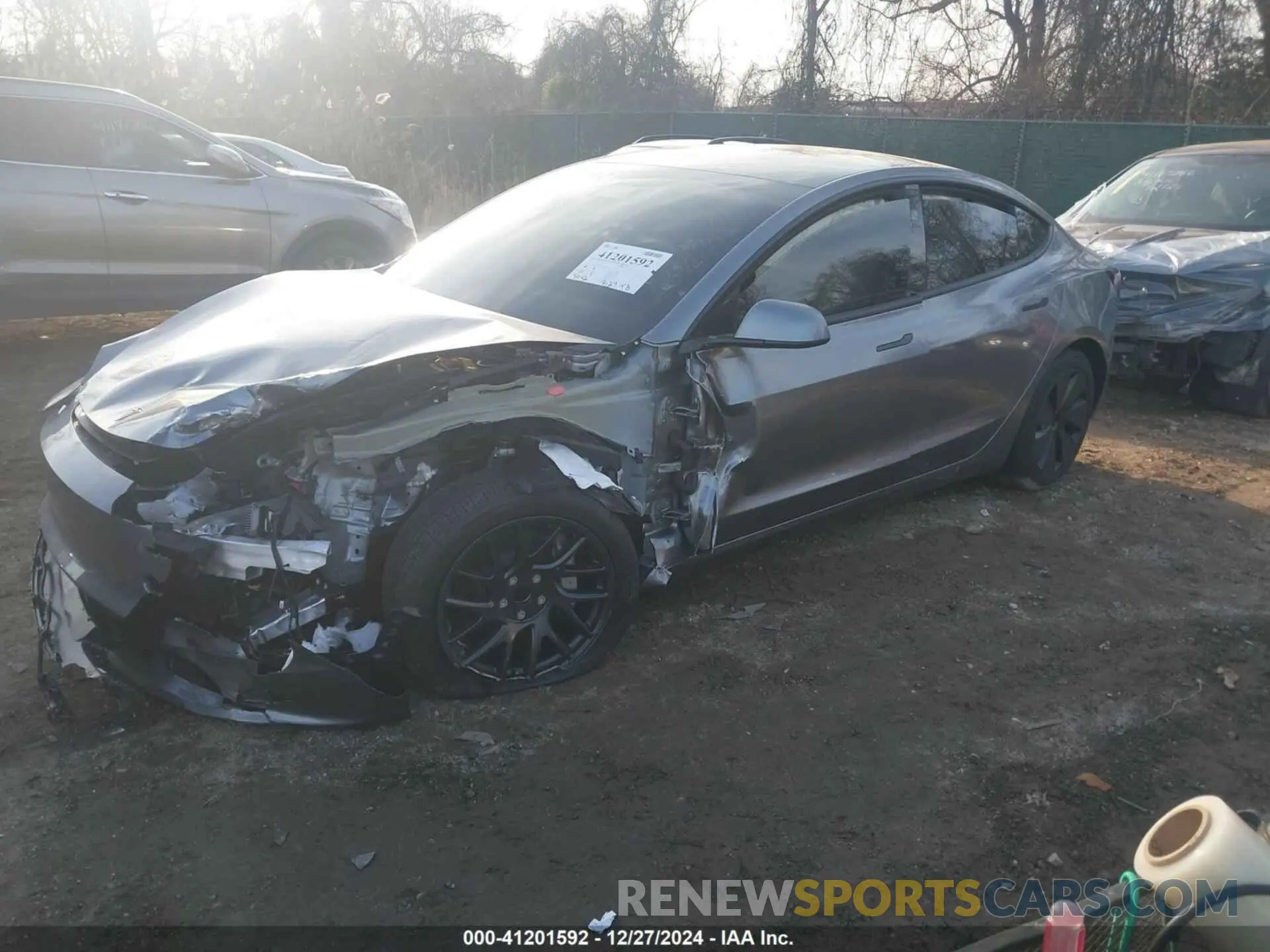 2 fotografías del automóvil dañado 5YJ3E1EA8RF869143 TESLA MODEL 3 2024