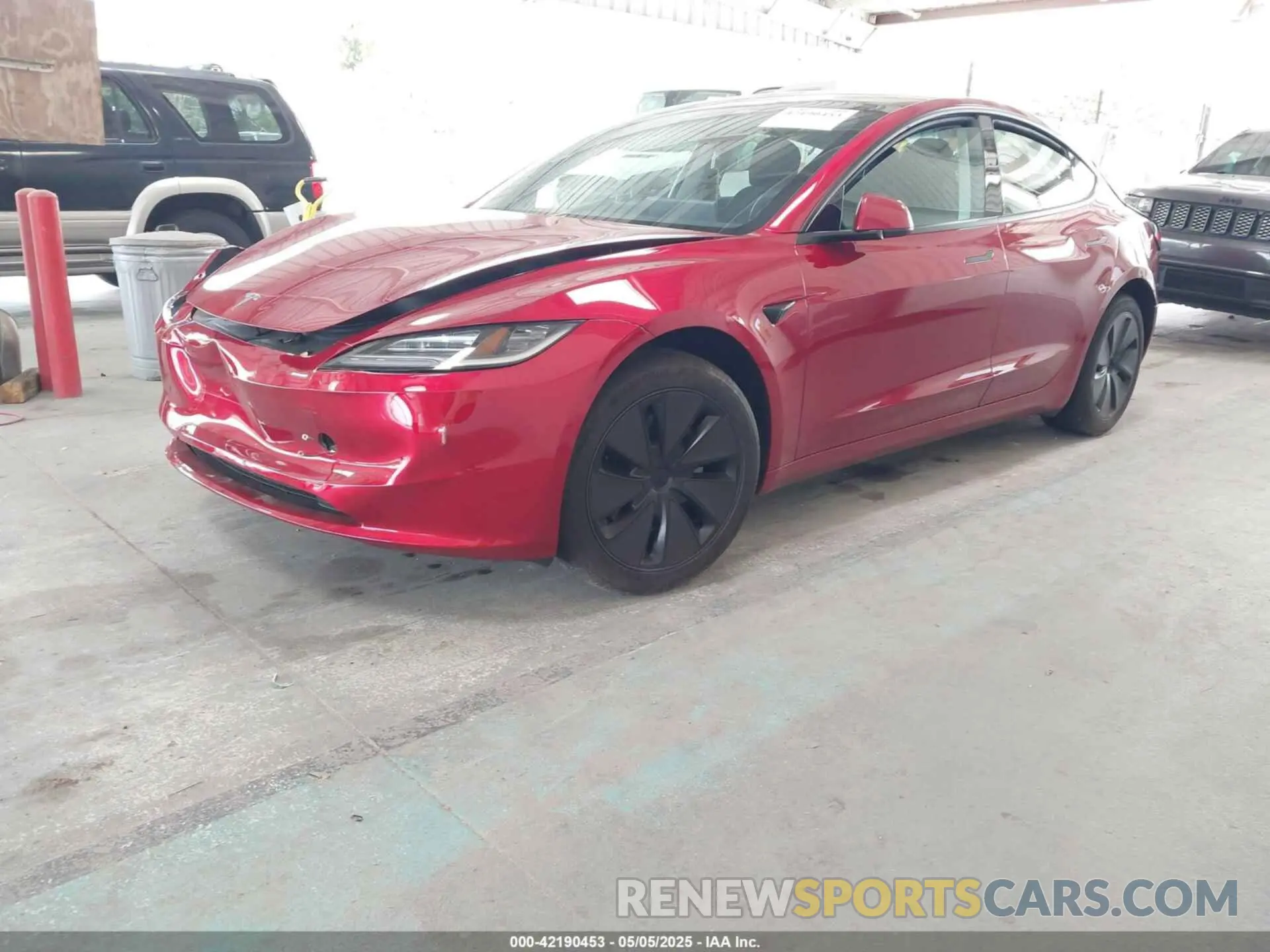 2 fotografías del automóvil dañado 5YJ3E1EAXRF732804 TESLA MODEL 3 2024