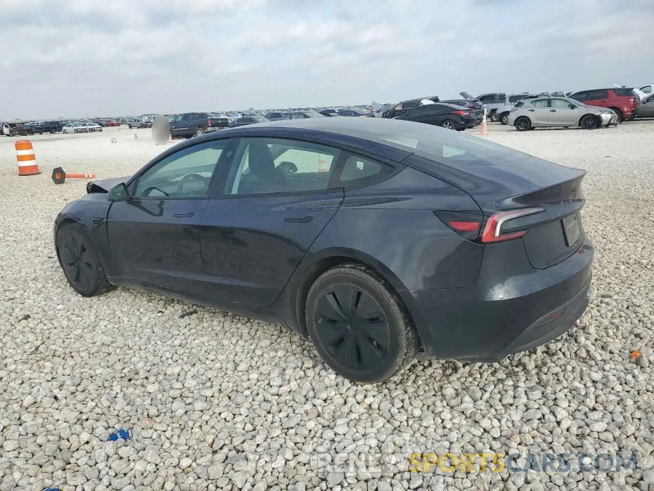 2 fotografías del automóvil dañado 5YJ3E1EAXRF741132 TESLA MODEL 3 2024