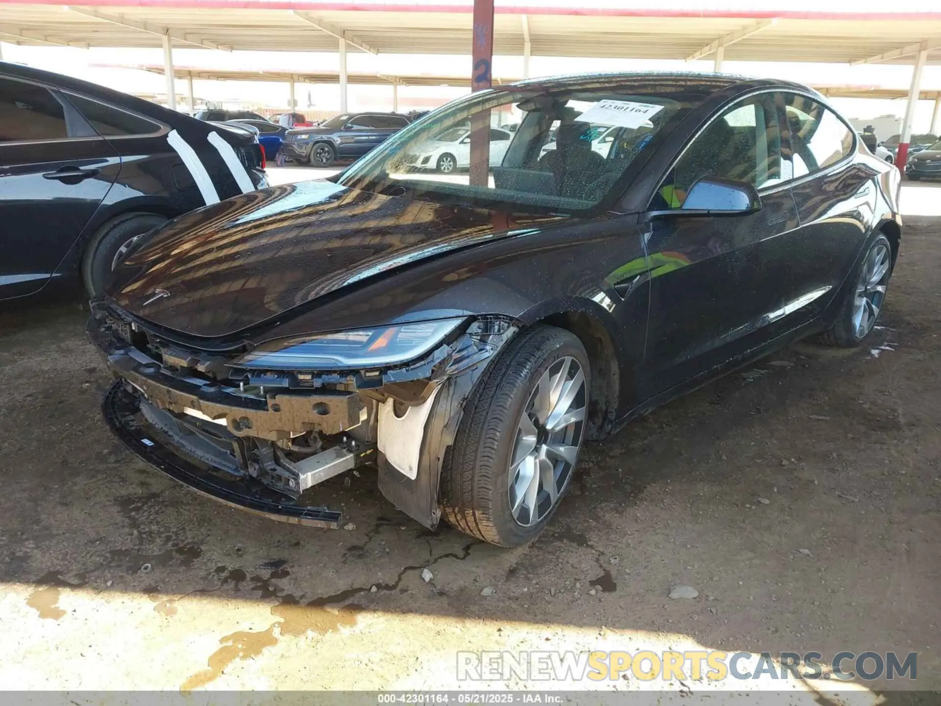 2 fotografías del automóvil dañado 5YJ3E1EAXRF750297 TESLA MODEL 3 2024