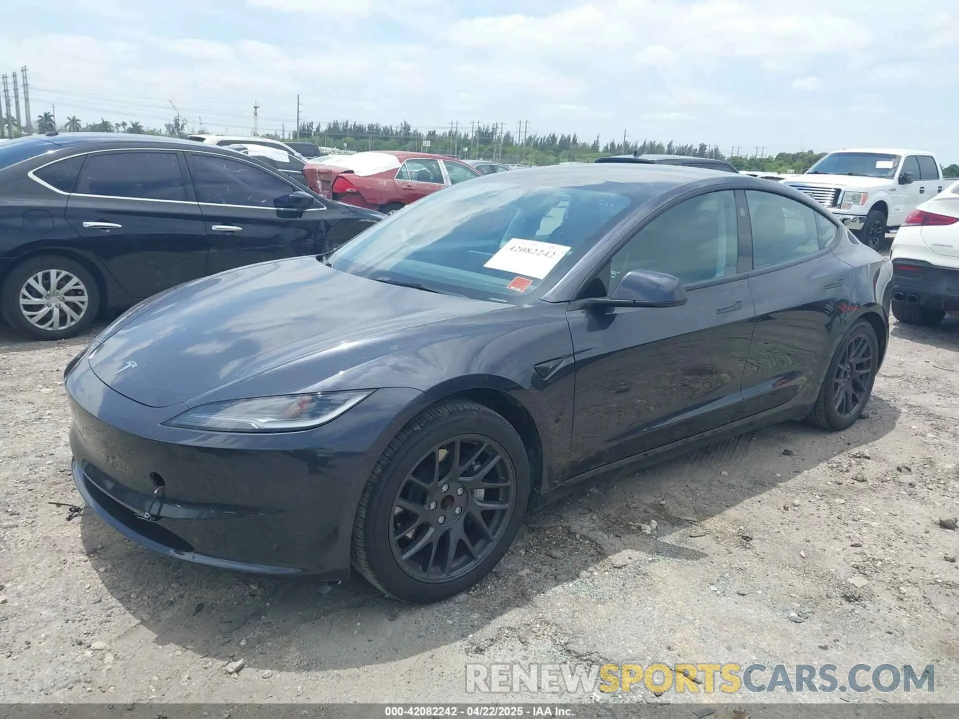 2 fotografías del automóvil dañado 5YJ3E1EAXRF754866 TESLA MODEL 3 2024