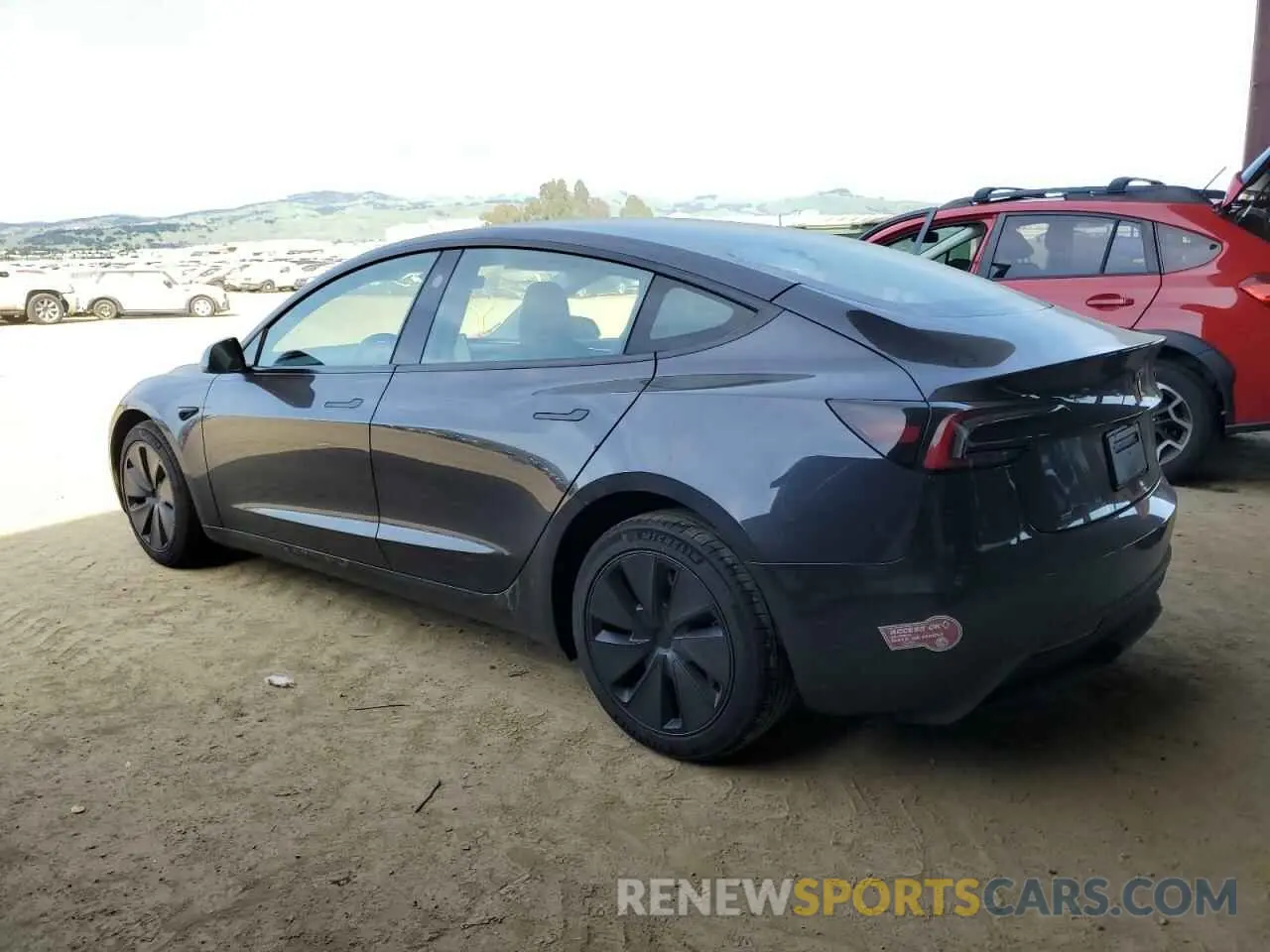 2 fotografías del automóvil dañado 5YJ3E1EAXRF782571 TESLA MODEL 3 2024