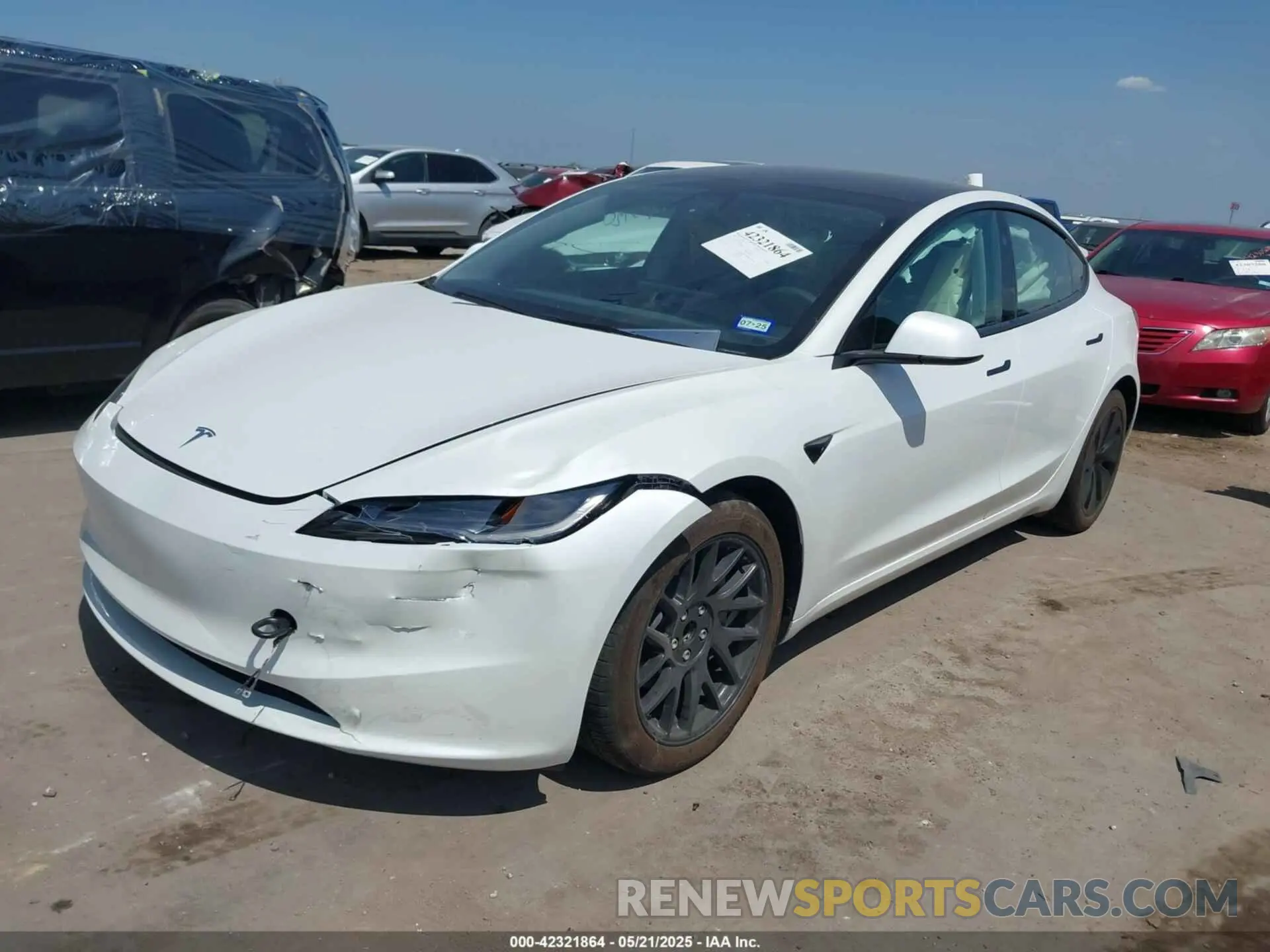 2 fotografías del automóvil dañado 5YJ3E1EAXRF785907 TESLA MODEL 3 2024