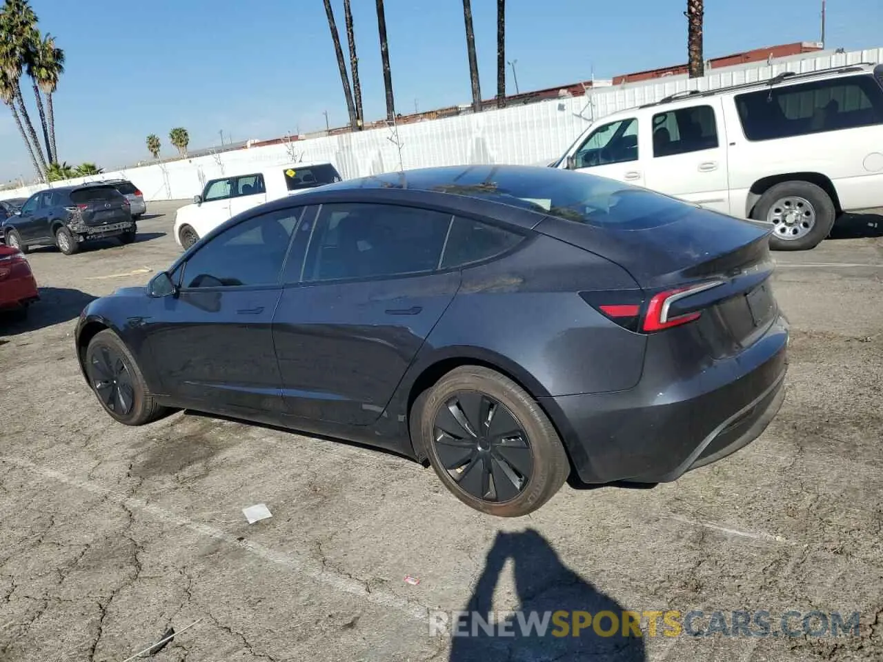 2 fotografías del automóvil dañado 5YJ3E1EAXRF834779 TESLA MODEL 3 2024