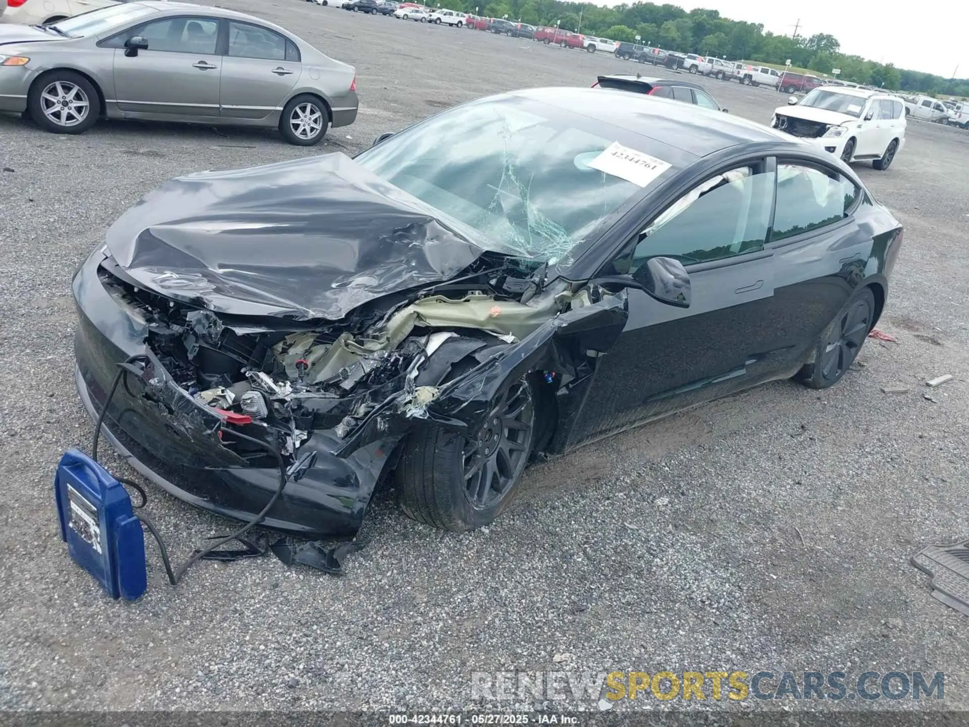 2 fotografías del automóvil dañado 5YJ3E1EAXRF859469 TESLA MODEL 3 2024