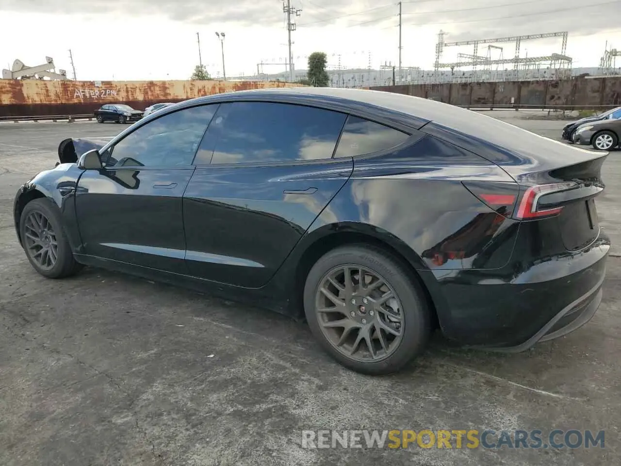 2 fotografías del automóvil dañado 5YJ3E1EAXRF867023 TESLA MODEL 3 2024