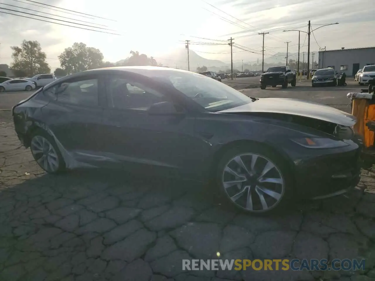 4 fotografías del automóvil dañado 5YJ3E1EAXRF869113 TESLA MODEL 3 2024