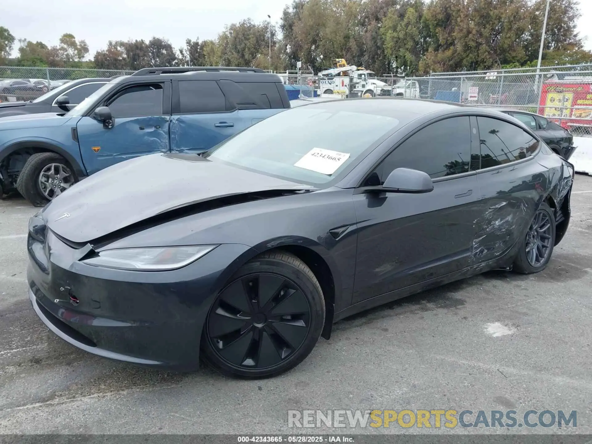 2 fotografías del automóvil dañado 5YJ3E1EB0RF766257 TESLA MODEL 3 2024