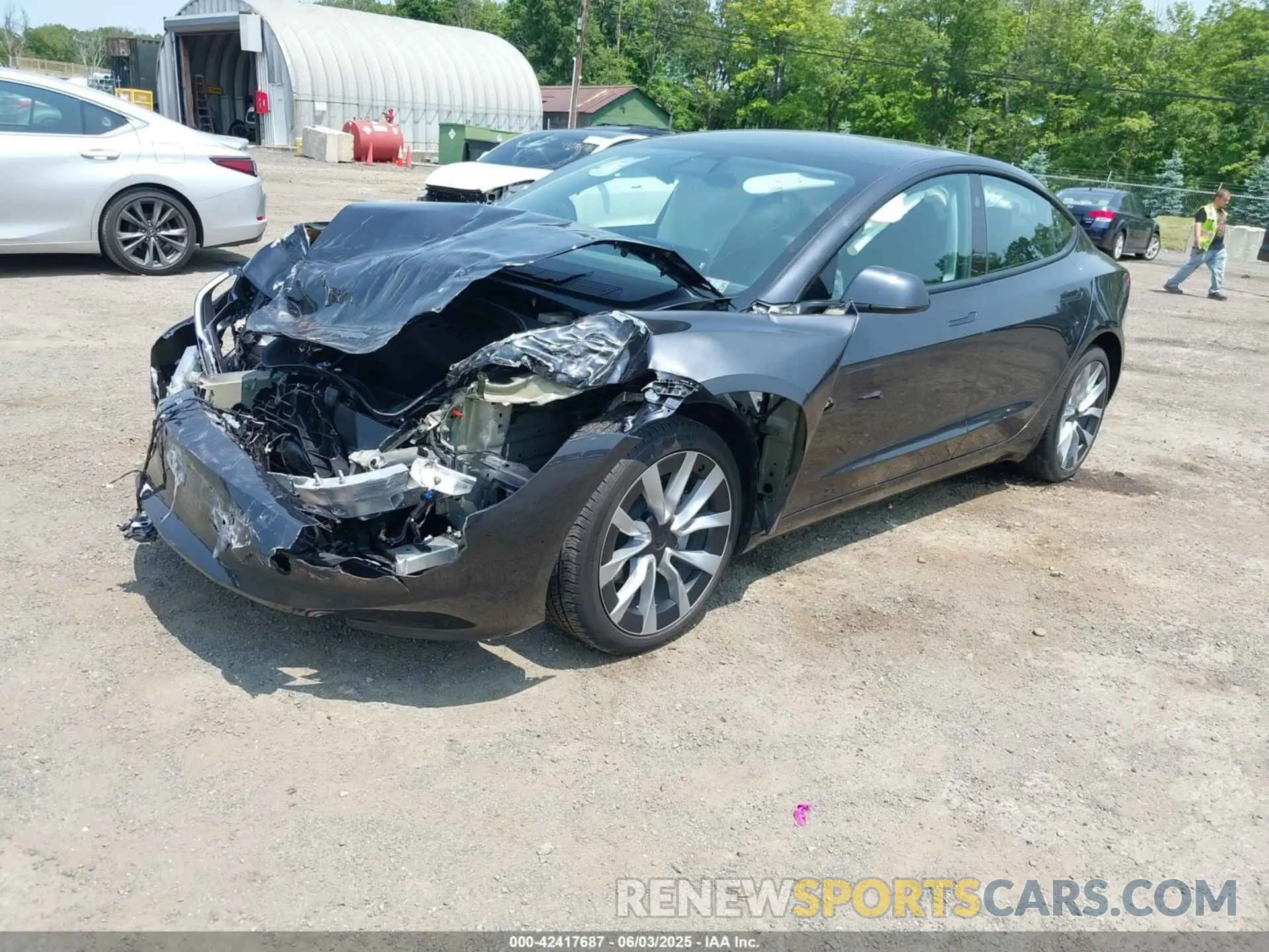 2 fotografías del automóvil dañado 5YJ3E1EB0RF766260 TESLA MODEL 3 2024