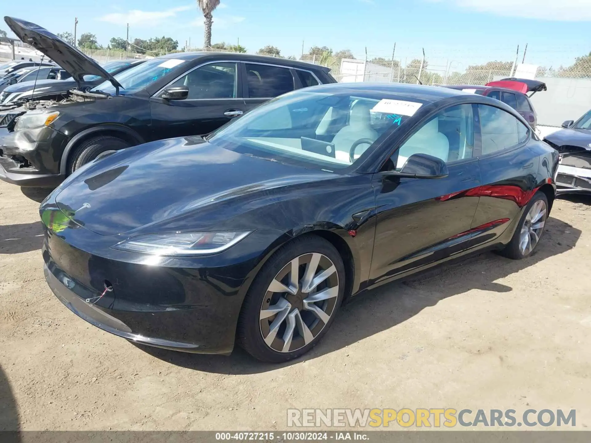 2 fotografías del automóvil dañado 5YJ3E1EB0RF792938 TESLA MODEL 3 2024