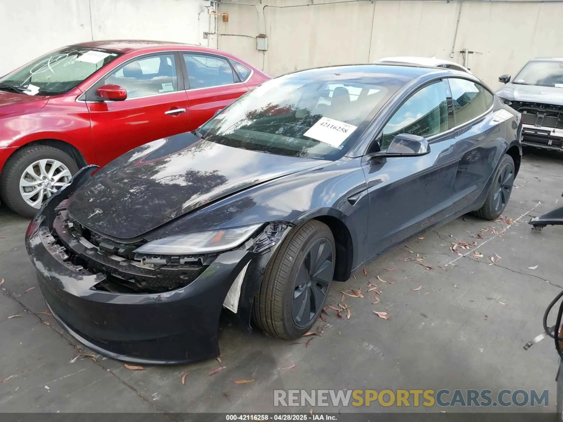 2 fotografías del automóvil dañado 5YJ3E1EB0RF812167 TESLA MODEL 3 2024