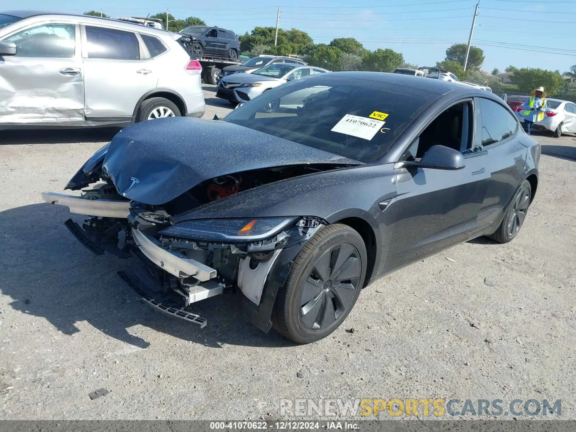 2 fotografías del automóvil dañado 5YJ3E1EB1RF732912 TESLA MODEL 3 2024