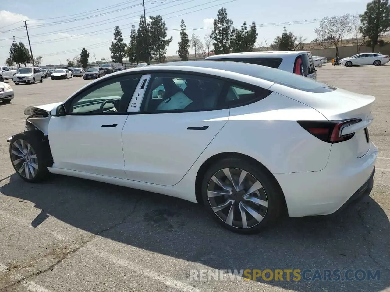 2 fotografías del automóvil dañado 5YJ3E1EB2RF732711 TESLA MODEL 3 2024