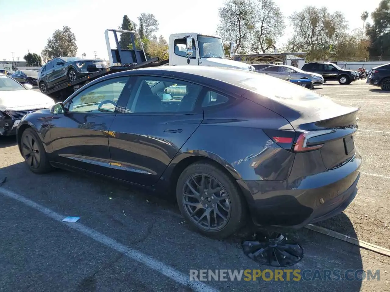 2 fotografías del automóvil dañado 5YJ3E1EB9RF766791 TESLA MODEL 3 2024