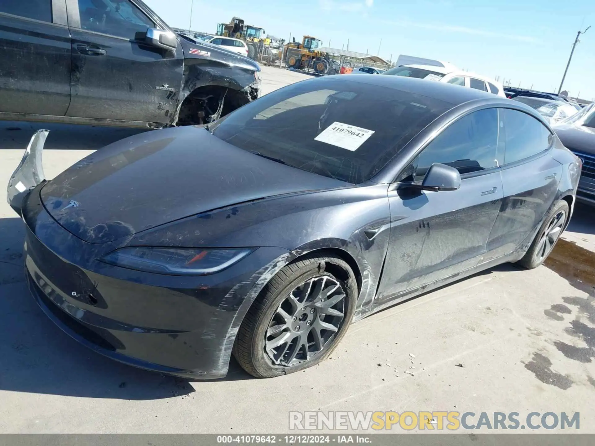 2 fotografías del automóvil dañado 5YJ3E1EBXRF789058 TESLA MODEL 3 2024