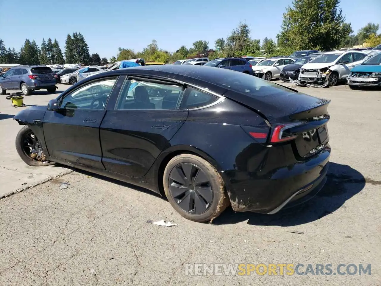 2 fotografías del automóvil dañado 5YJ3E1EBXRF789514 TESLA MODEL 3 2024