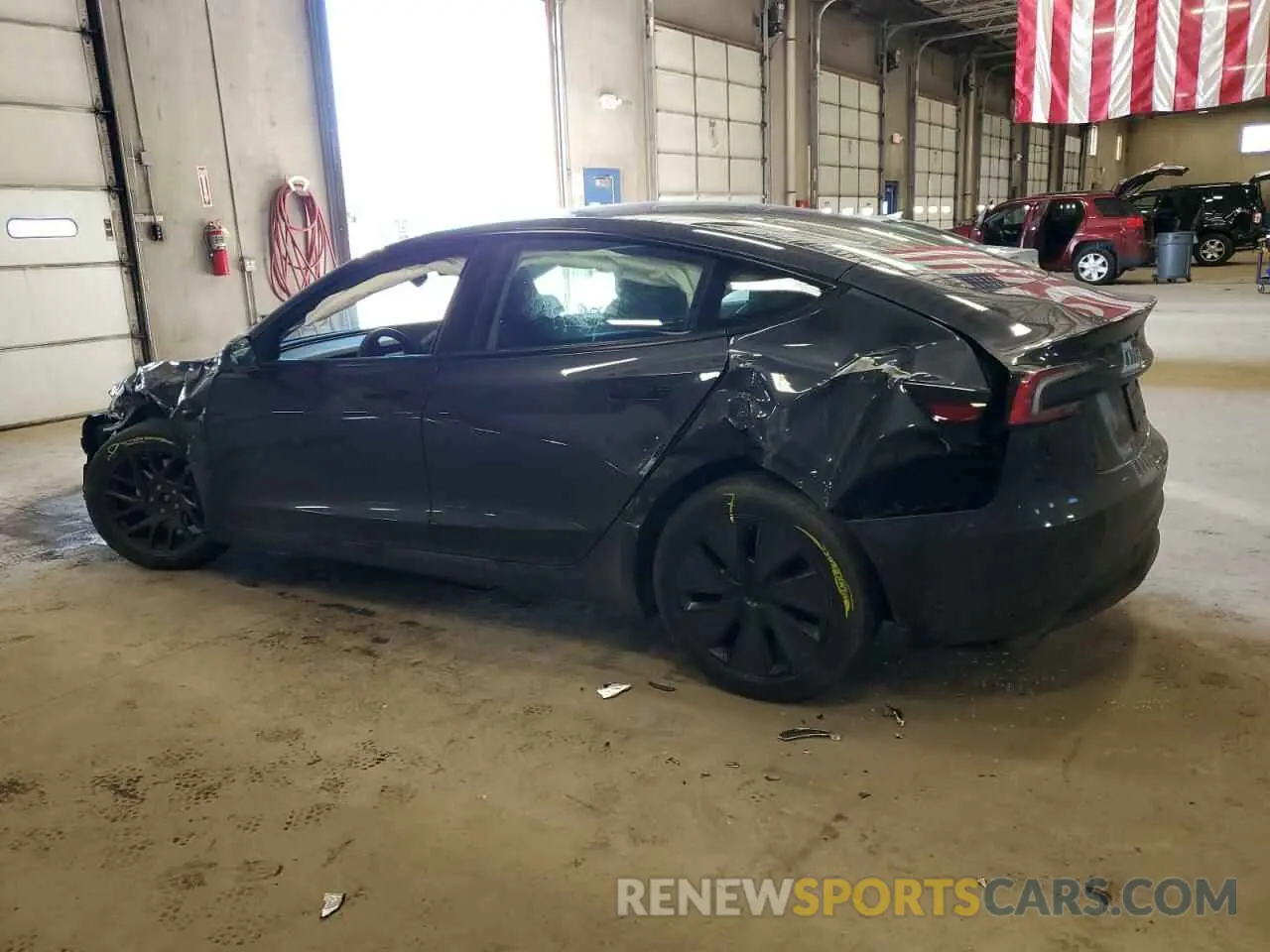 2 fotografías del automóvil dañado 5YJ3E1EBXRF818977 TESLA MODEL 3 2024