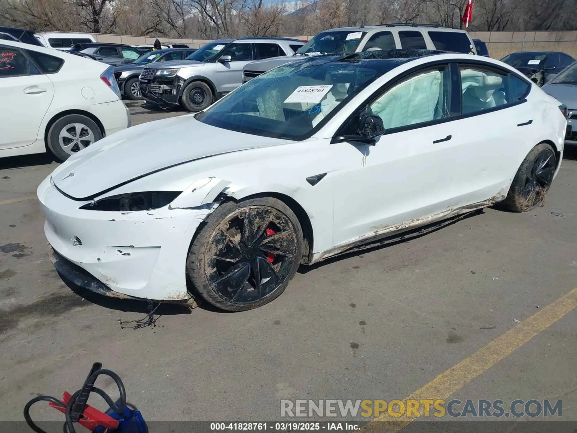 2 fotografías del automóvil dañado 5YJ3E1ET0RF793242 TESLA MODEL 3 2024