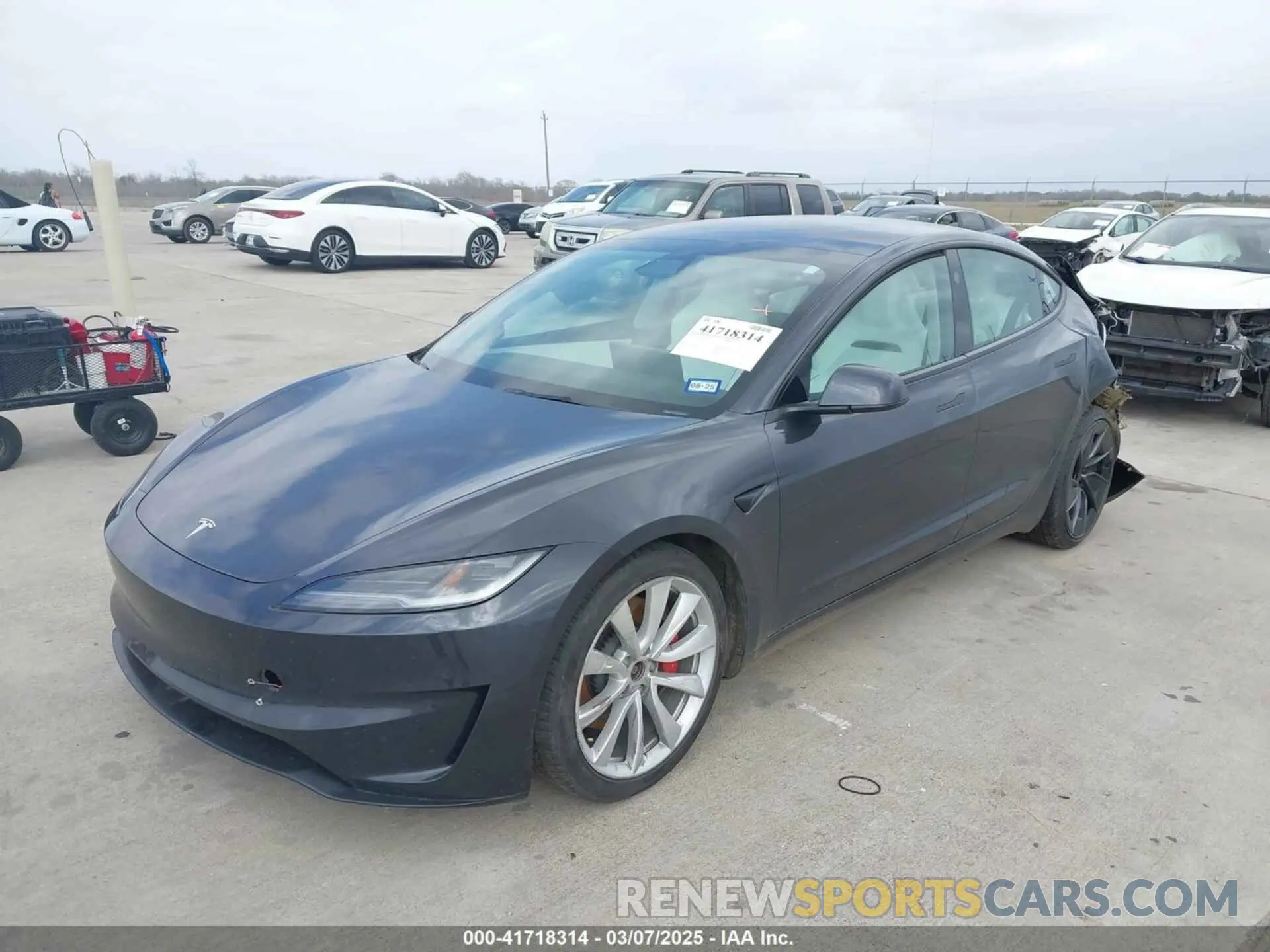 2 fotografías del automóvil dañado 5YJ3E1ET0RF842987 TESLA MODEL 3 2024