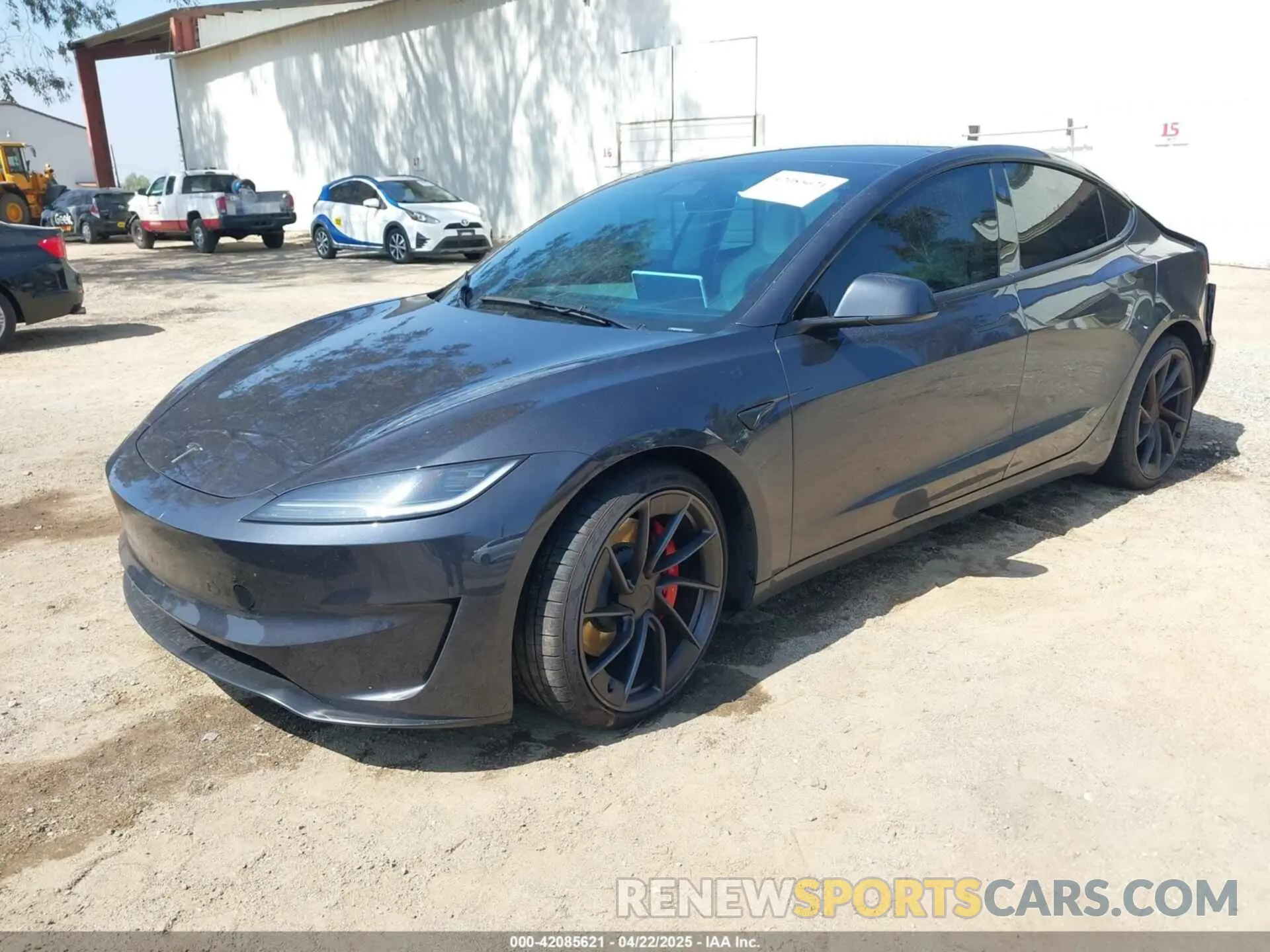 2 fotografías del automóvil dañado 5YJ3E1ET1RF867803 TESLA MODEL 3 2024