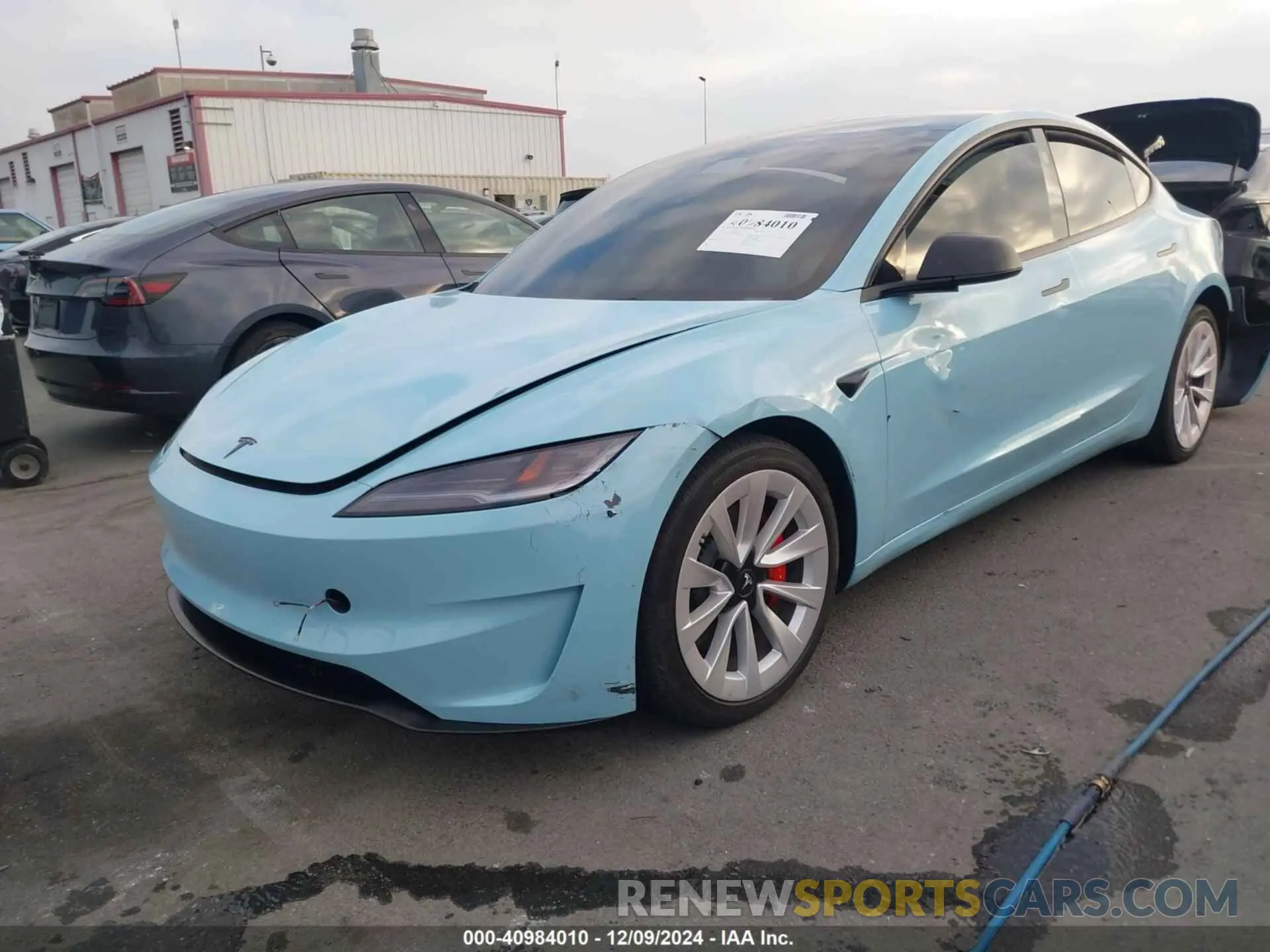 2 fotografías del automóvil dañado 5YJ3E1ET5RF863849 TESLA MODEL 3 2024