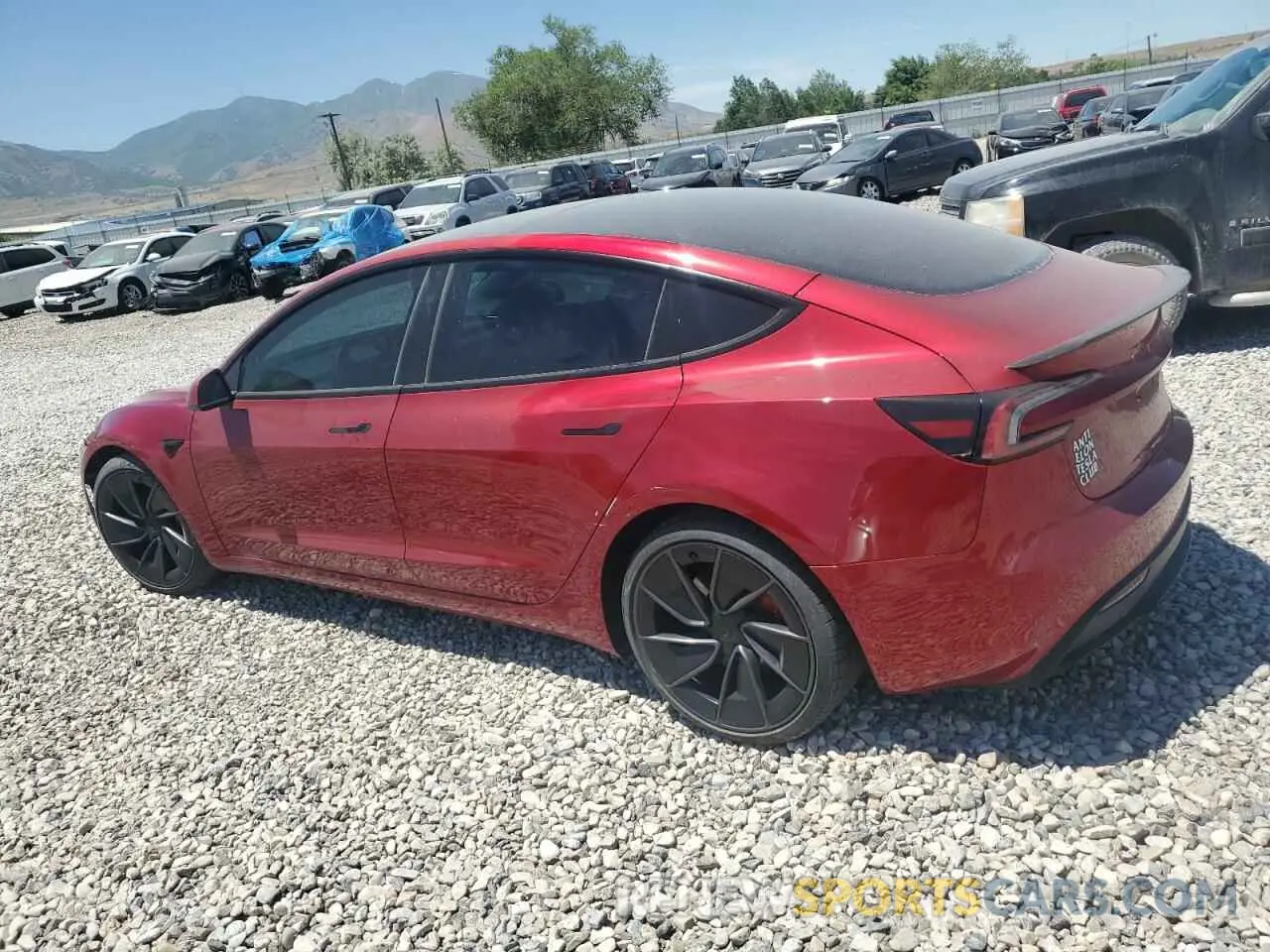 2 fotografías del automóvil dañado 5YJ3E1ET6RF796386 TESLA MODEL 3 2024