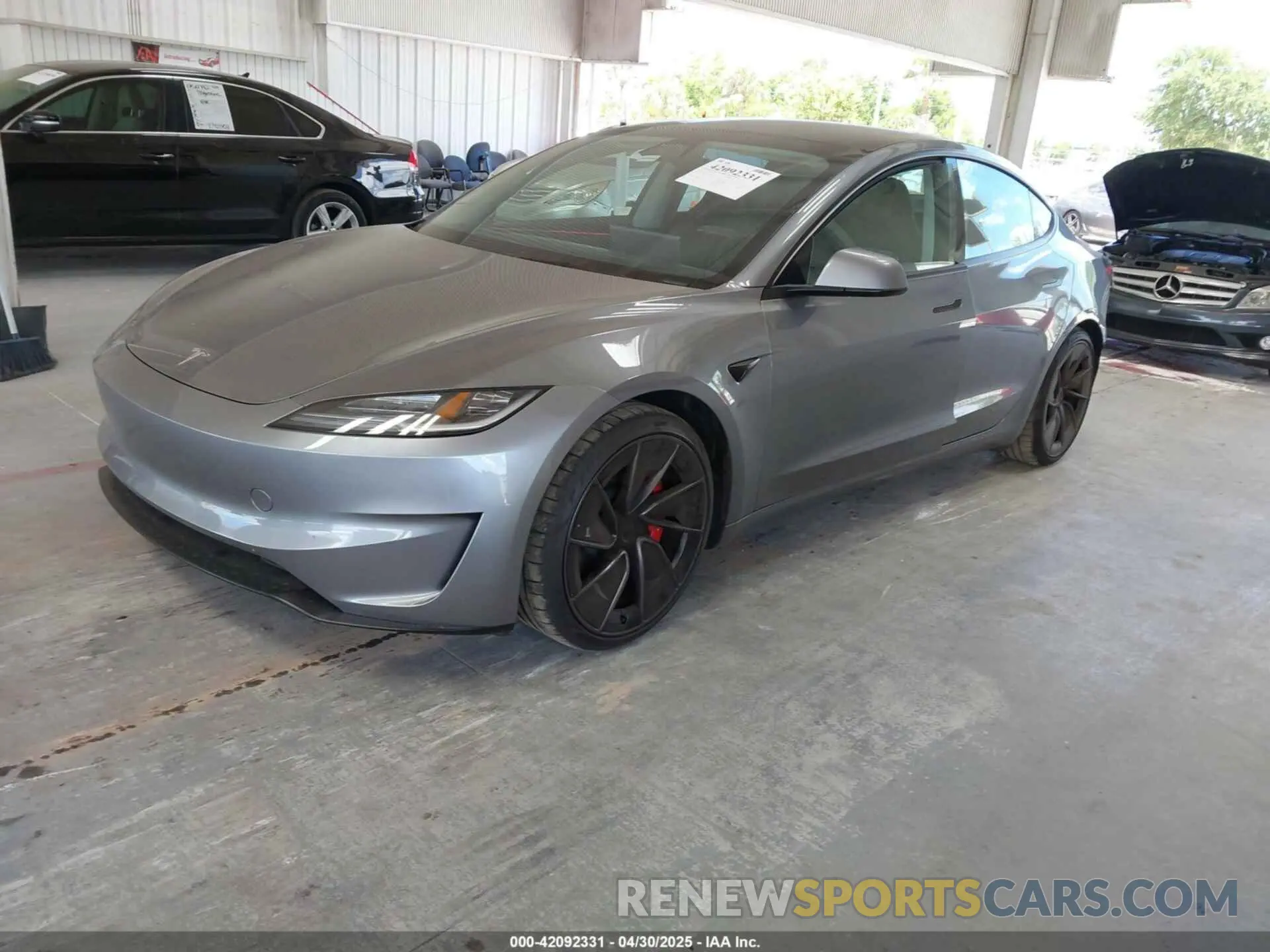 2 fotografías del automóvil dañado 5YJ3E1ET6RF862371 TESLA MODEL 3 2024