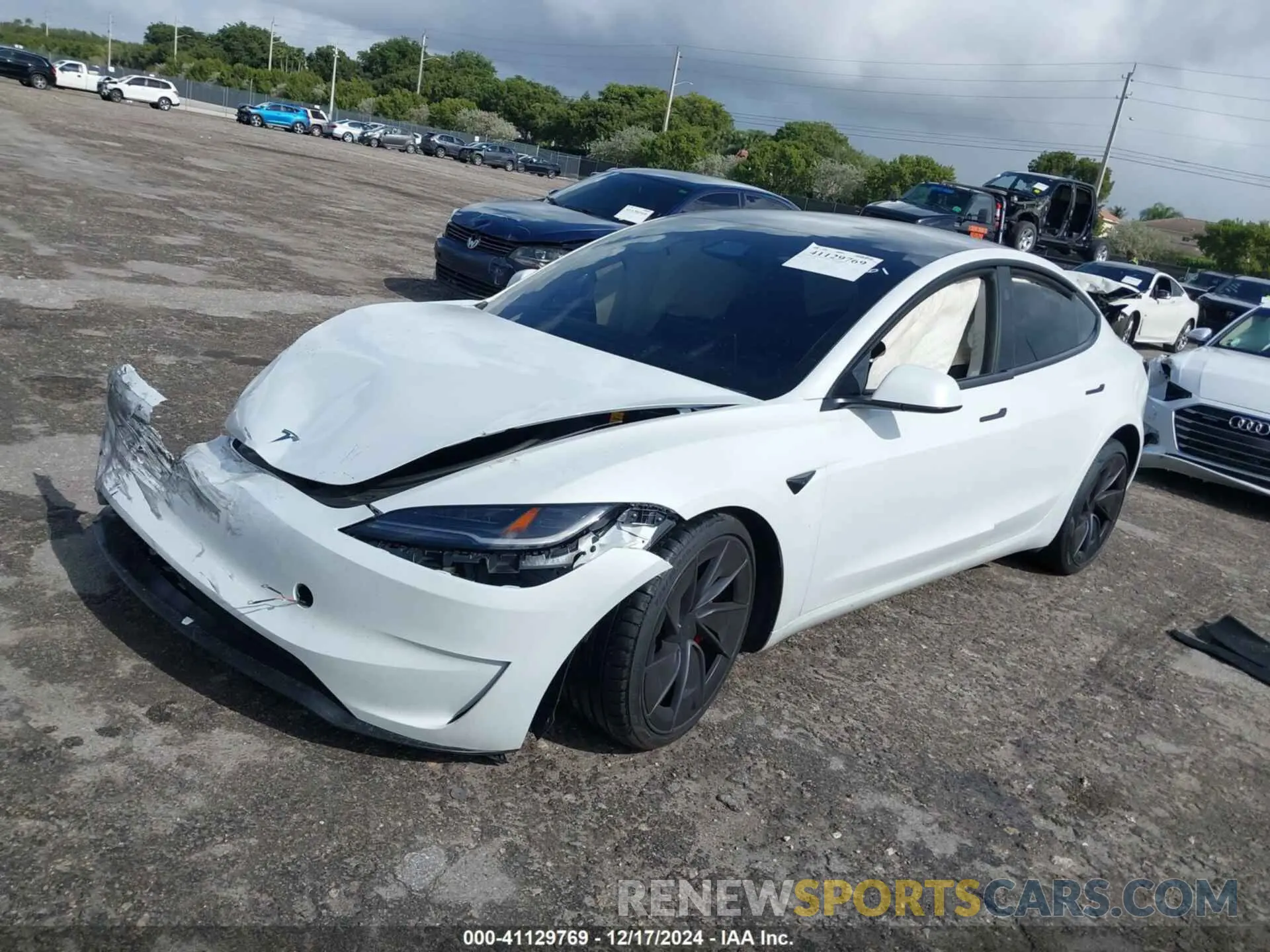 2 fotografías del automóvil dañado 5YJ3E1ET7RF801529 TESLA MODEL 3 2024