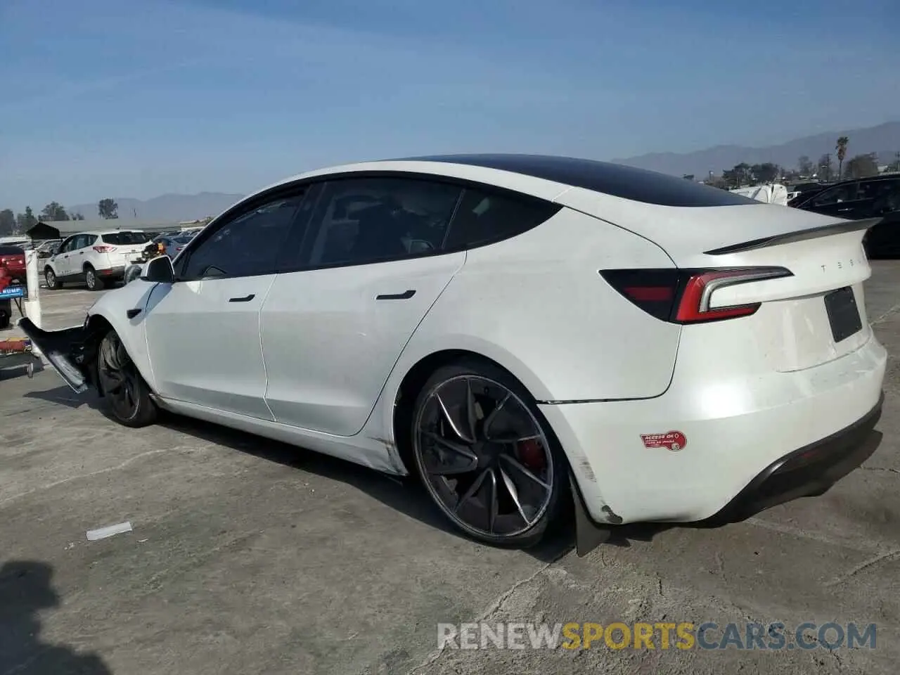 2 fotografías del automóvil dañado 5YJ3E1ET7RF890521 TESLA MODEL 3 2024