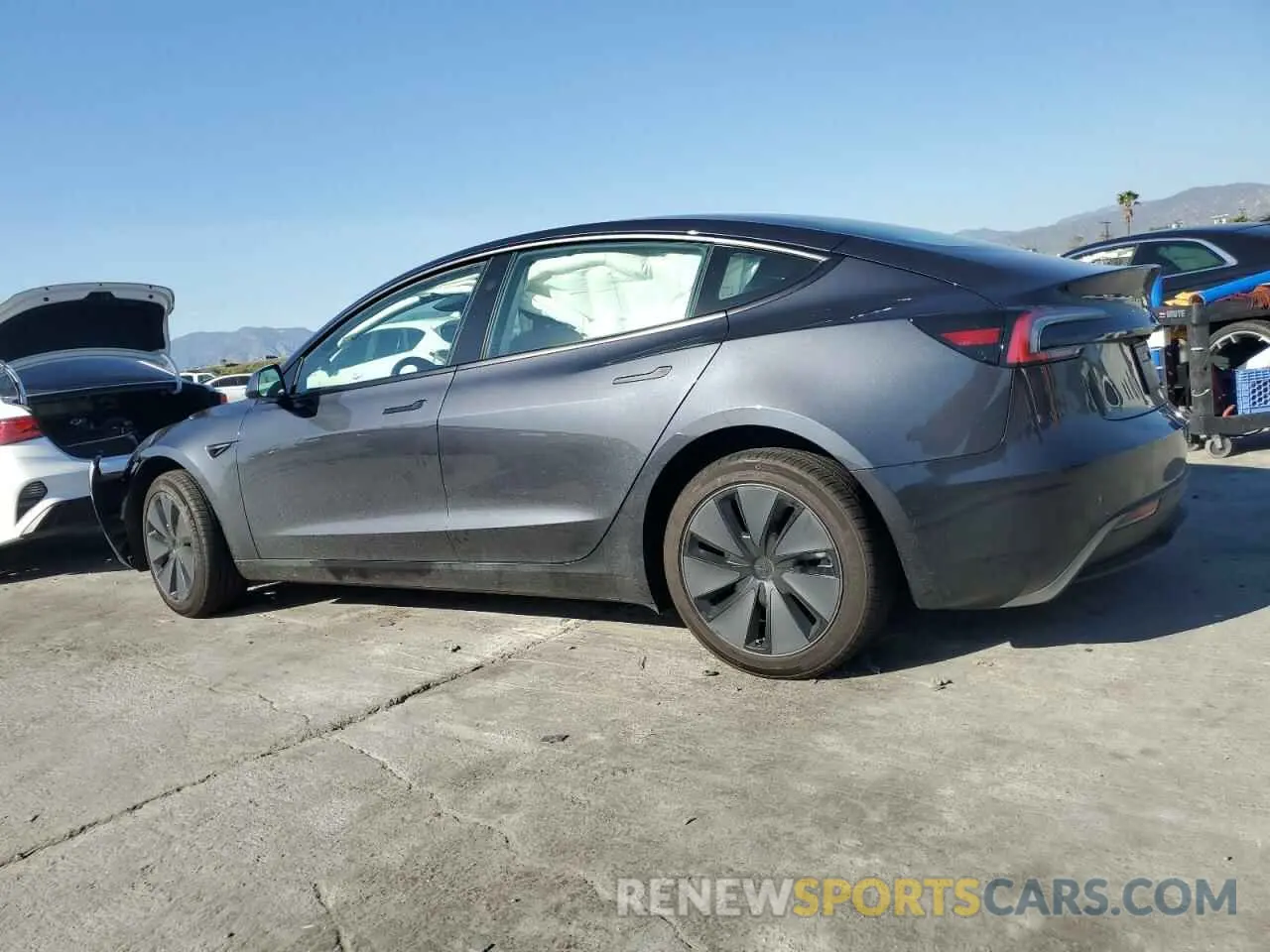 2 fotografías del automóvil dañado 5YJ3E1EA6SF895973 TESLA MODEL 3 2025