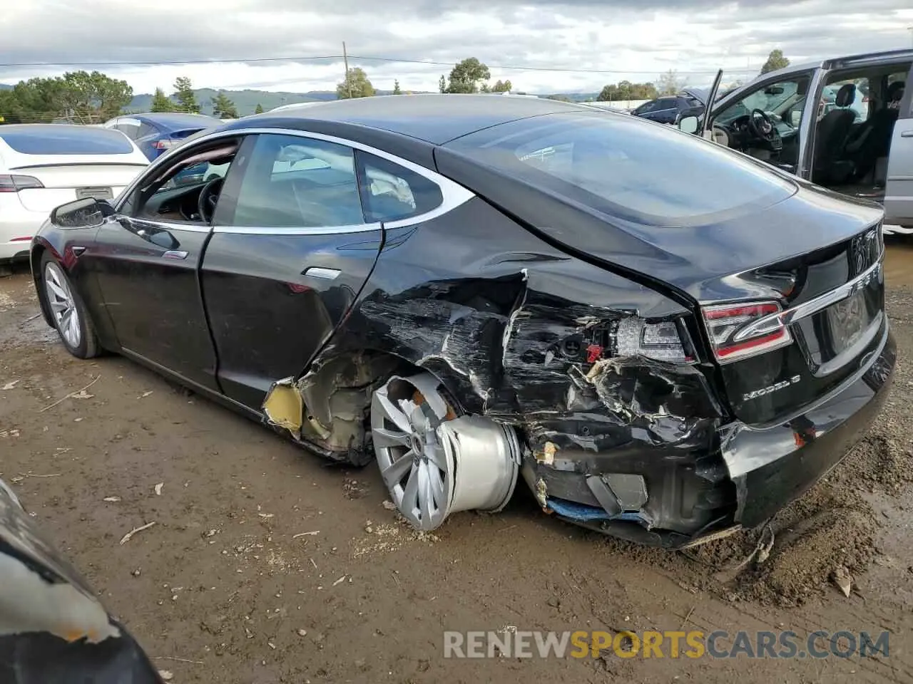 2 fotografías del automóvil dañado 5YJSA1E21KF307185 TESLA MODEL S 2019