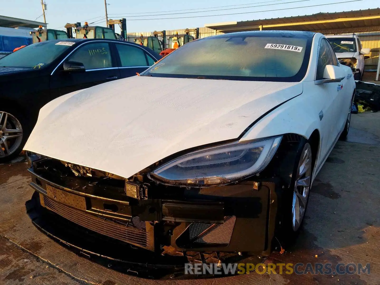 2 fotografías del automóvil dañado 5YJSA1E27KF347836 TESLA MODEL S 2019