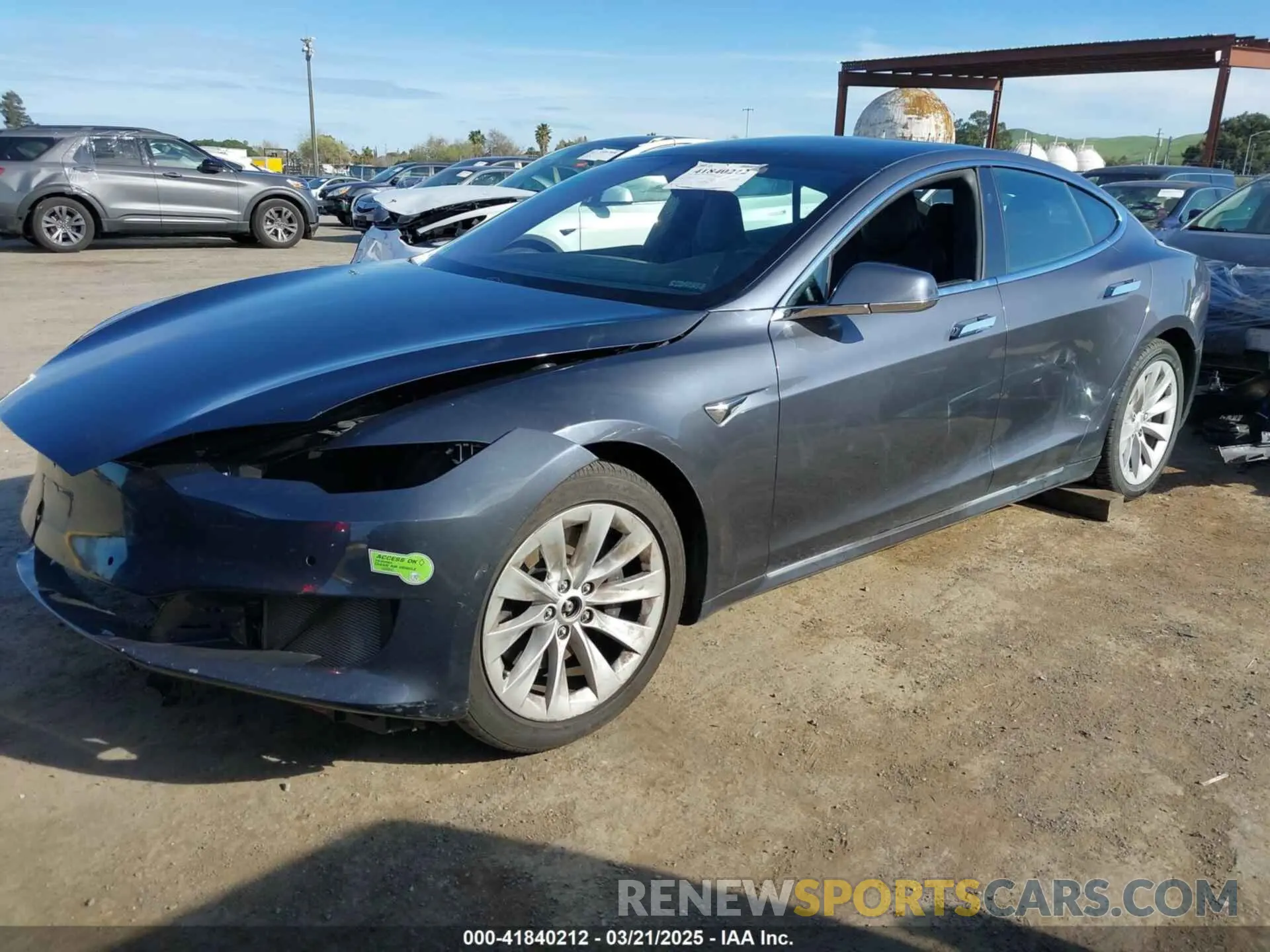 2 fotografías del automóvil dañado 5YJSA1E29KF348051 TESLA MODEL S 2019