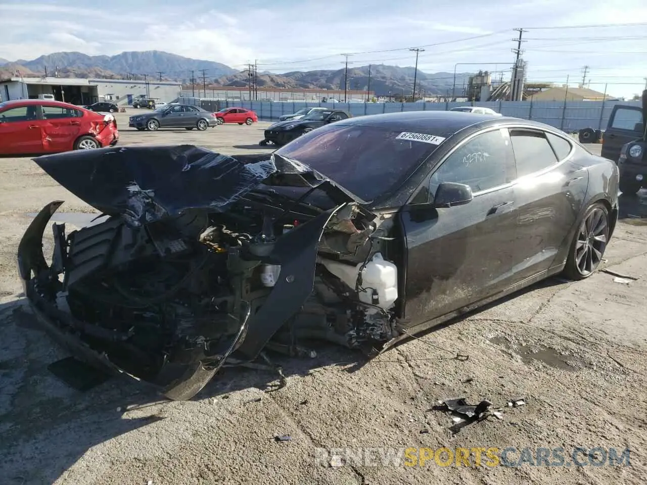 2 fotografías del automóvil dañado 5YJSA1E2XKF335082 TESLA MODEL S 2019