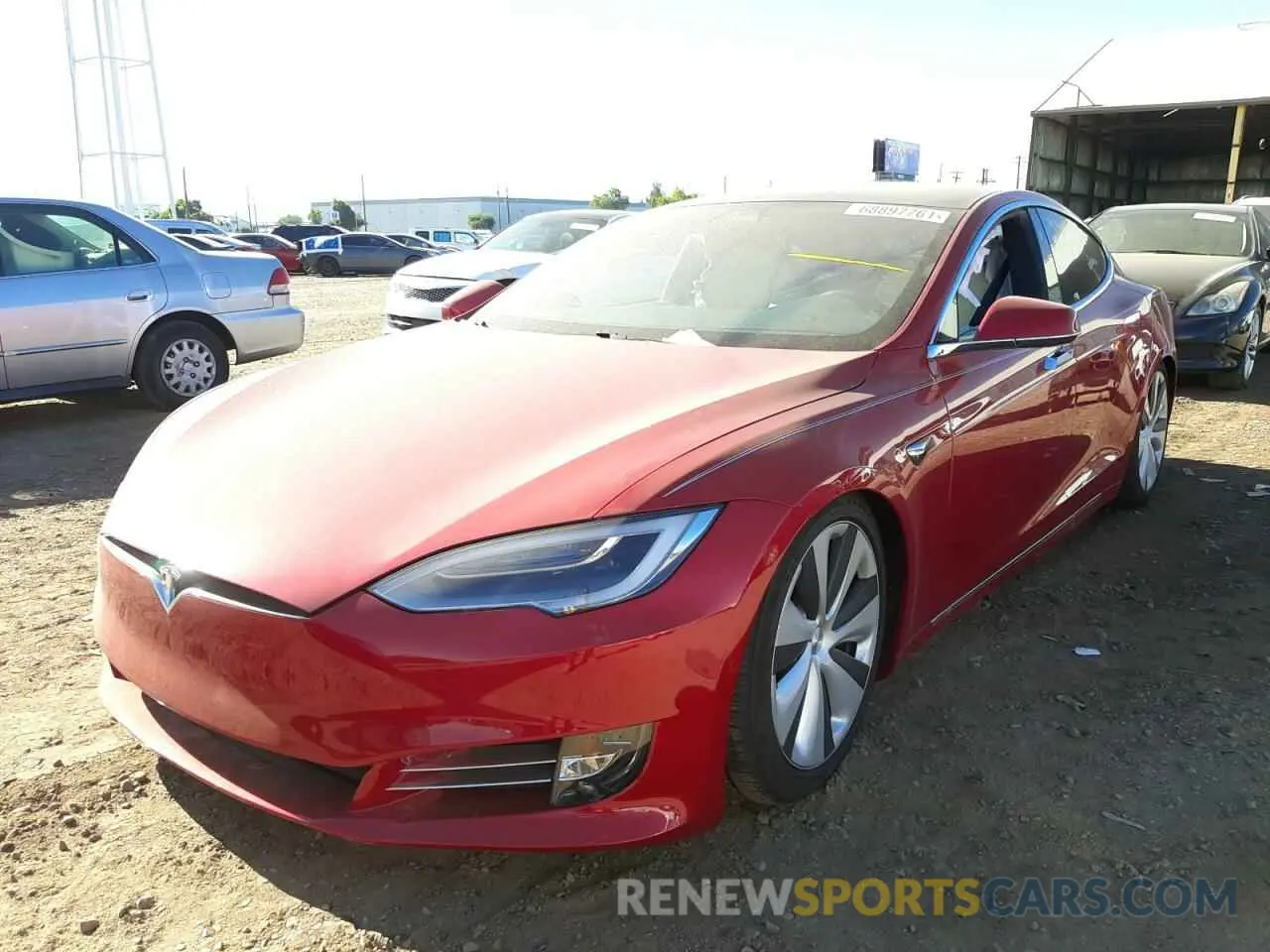 2 fotografías del automóvil dañado 5YJSA1E23LF401148 TESLA MODEL S 2020