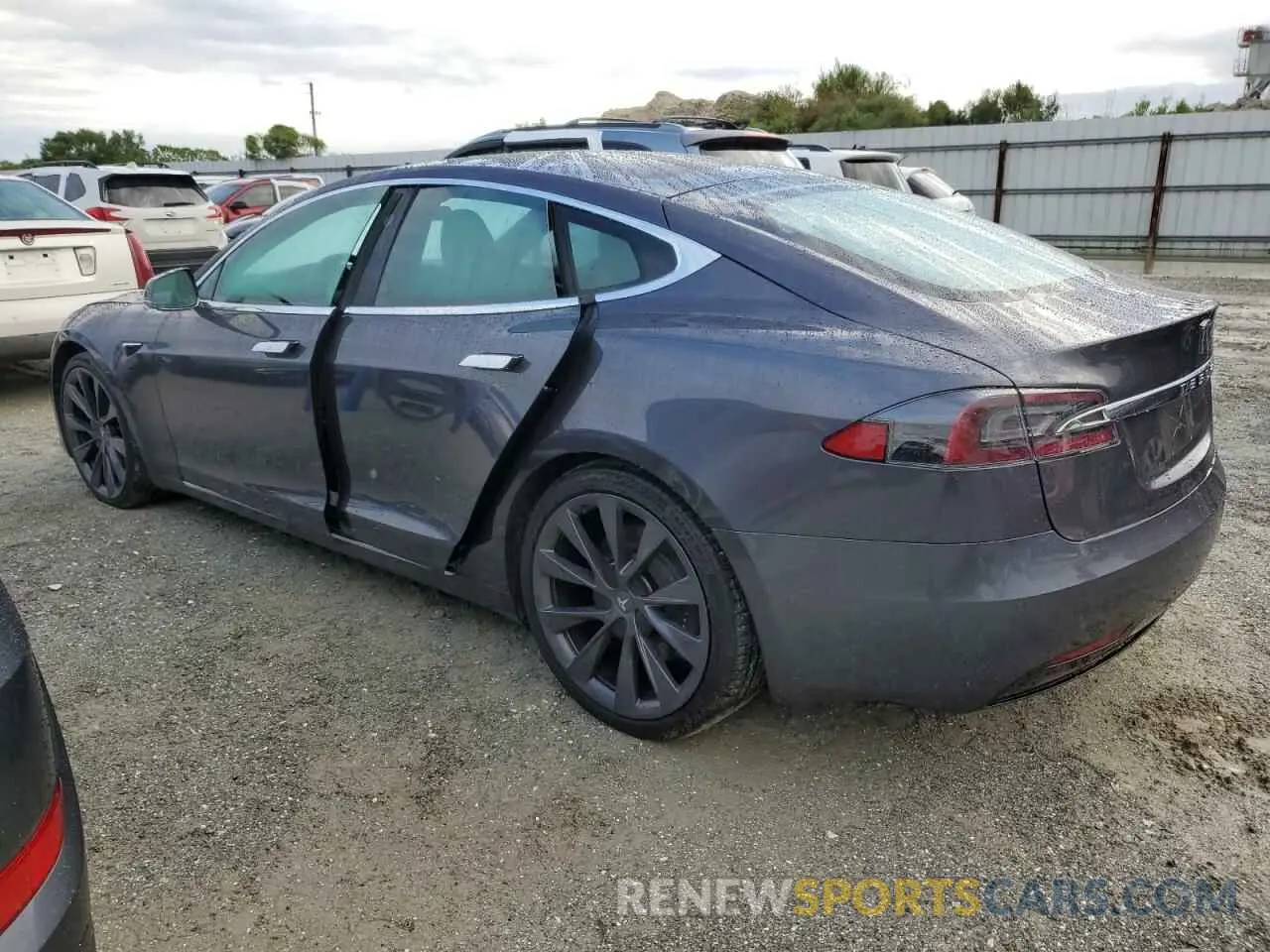 2 fotografías del automóvil dañado 5YJSA1E2XLF413121 TESLA MODEL S 2020