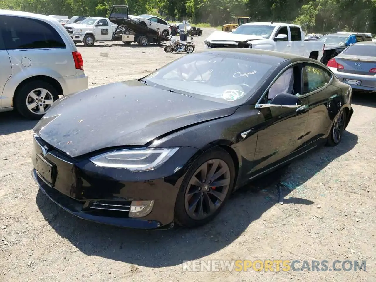2 fotografías del automóvil dañado 5YJSA1E4XLF390814 TESLA MODEL S 2020