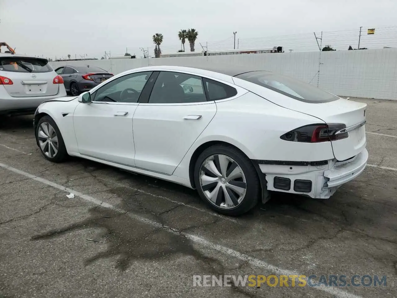 2 fotografías del automóvil dañado 5YJSA1E24MF427775 TESLA MODEL S 2021