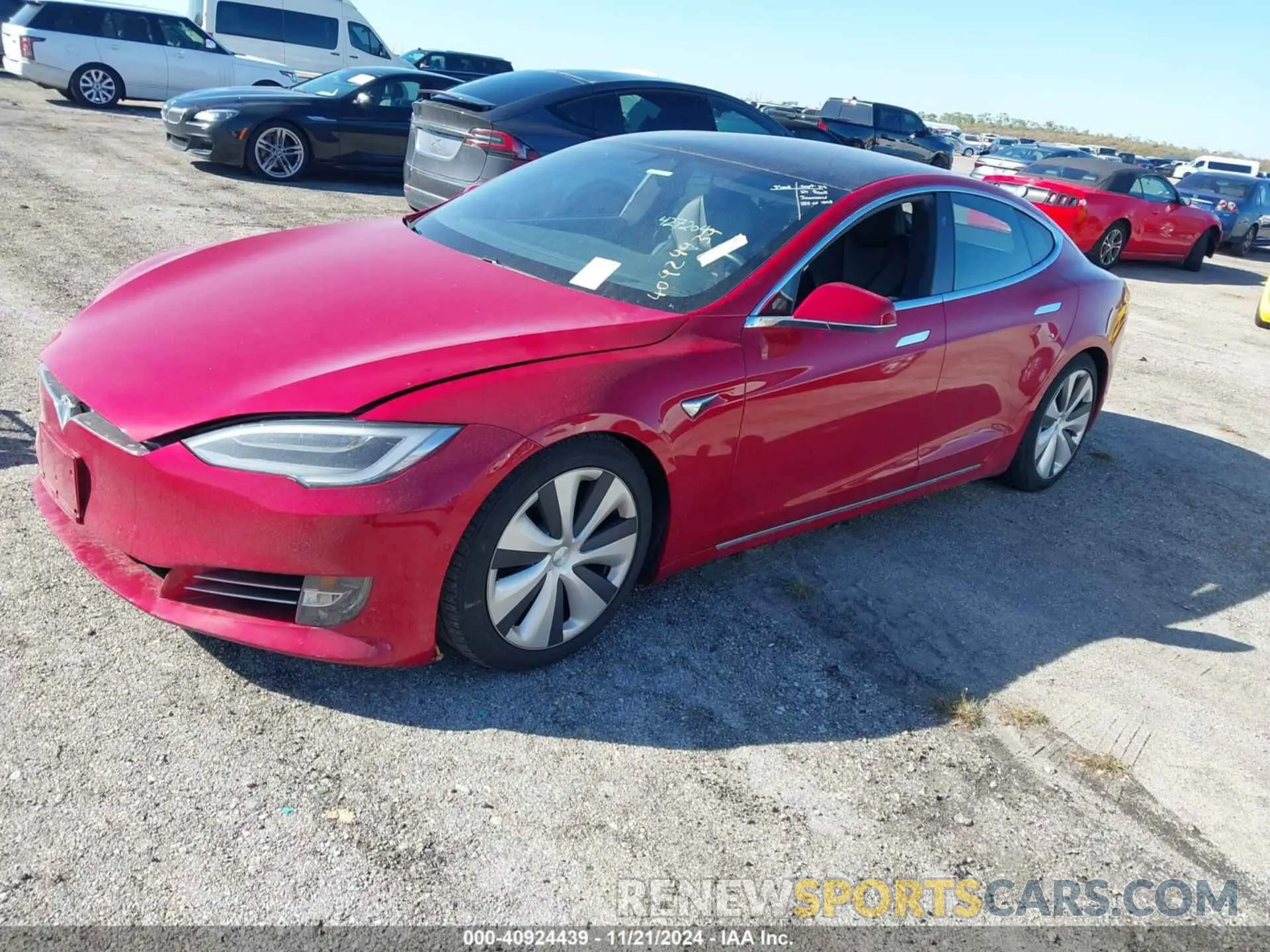 2 fotografías del automóvil dañado 5YJSA1E25MF427204 TESLA MODEL S 2021