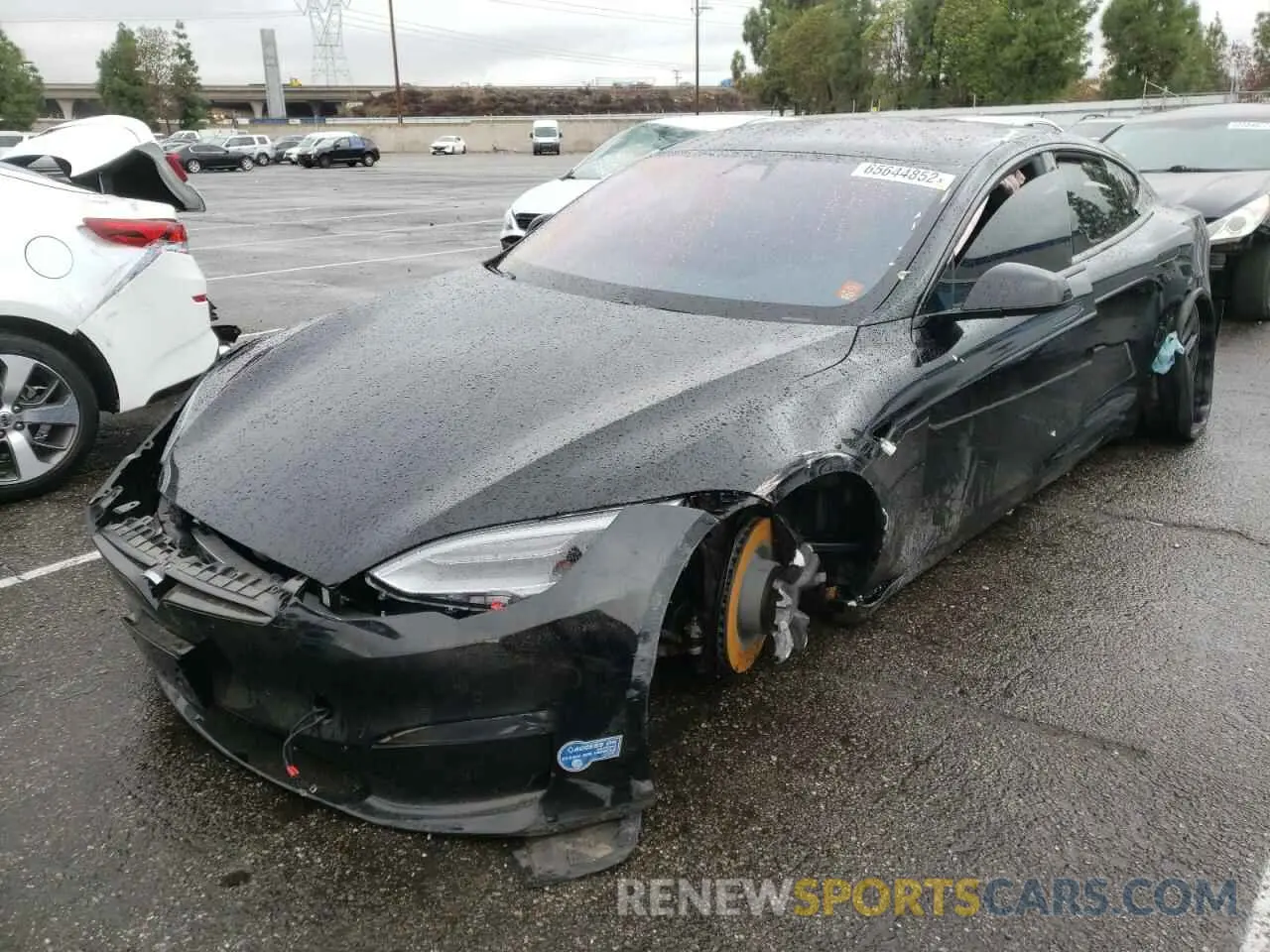 2 fotografías del automóvil dañado 5YJSA1E54MF436244 TESLA MODEL S 2021