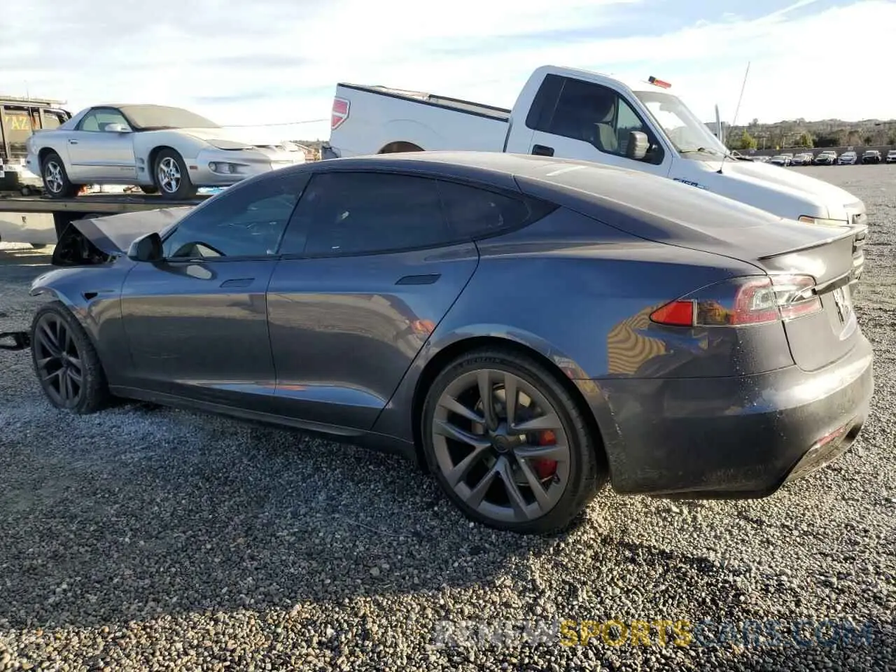 2 fotografías del automóvil dañado 5YJSA1E55MF435863 TESLA MODEL S 2021