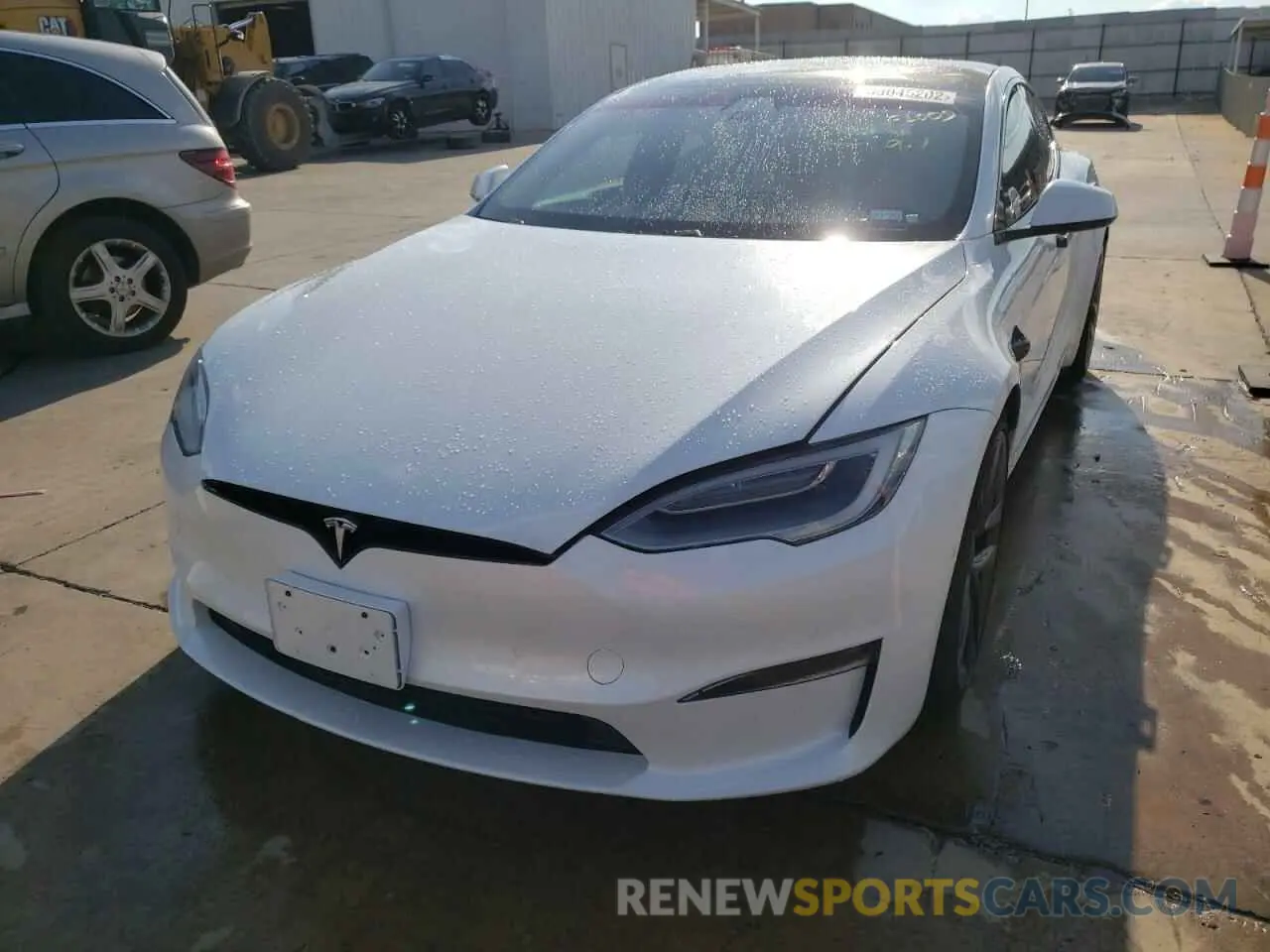 2 fotografías del automóvil dañado 5YJSA1E56MF429313 TESLA MODEL S 2021